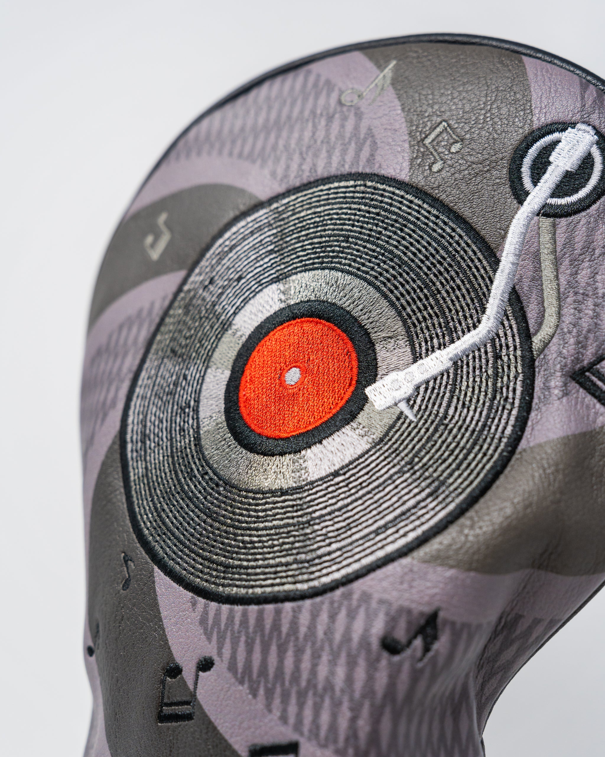 Music City driver headcover featuring a vibrant design with musical notes and iconic Nashville skyline.