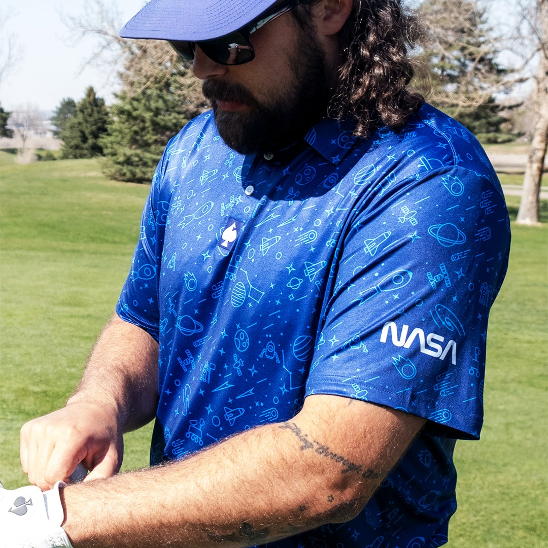 NASA branded polo shirt featuring the iconic NASA logo on a navy blue background.