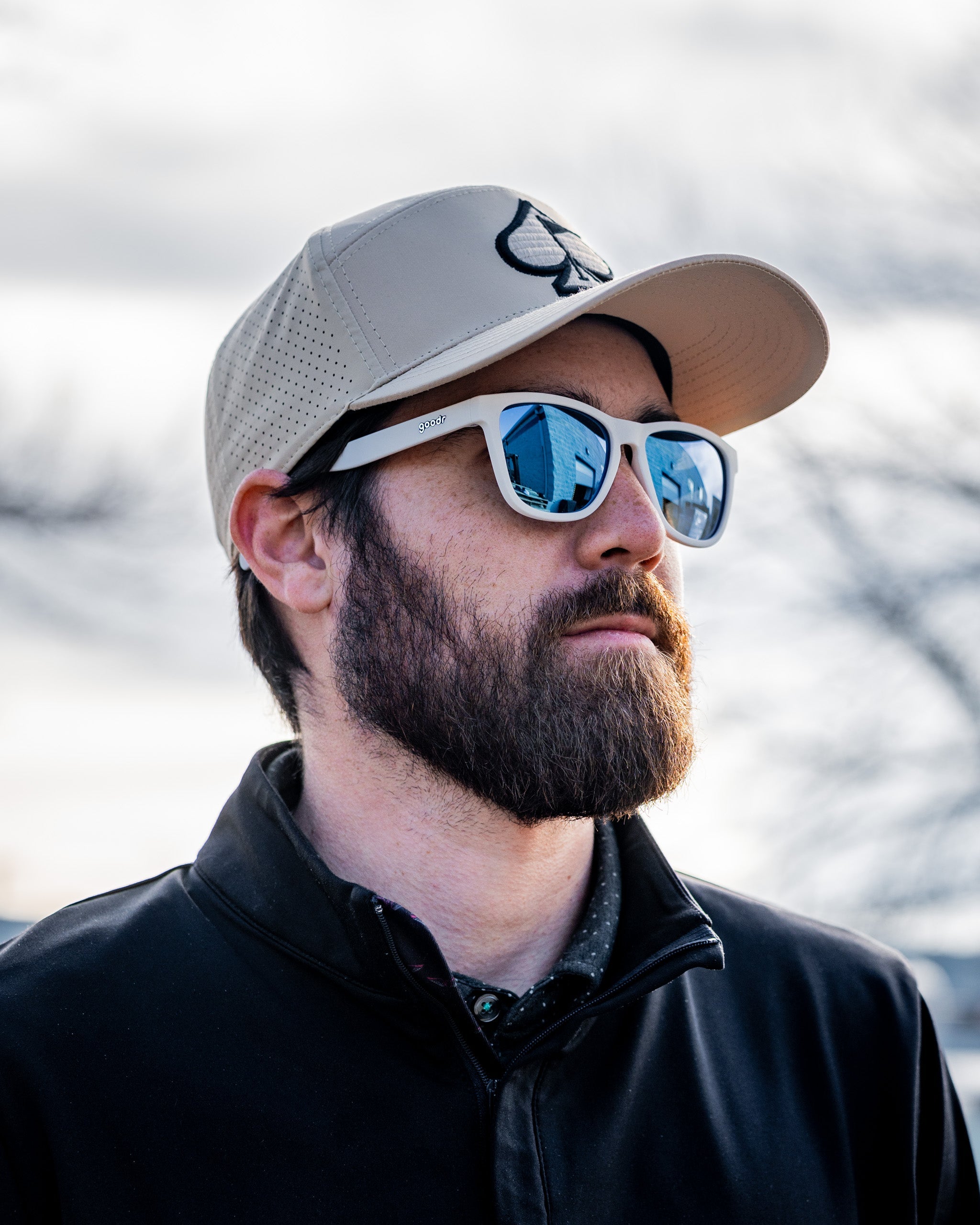 Tradesman Hat in Sand color, featuring a wide brim and adjustable chin strap, perfect for sun protection and outdoor activities.