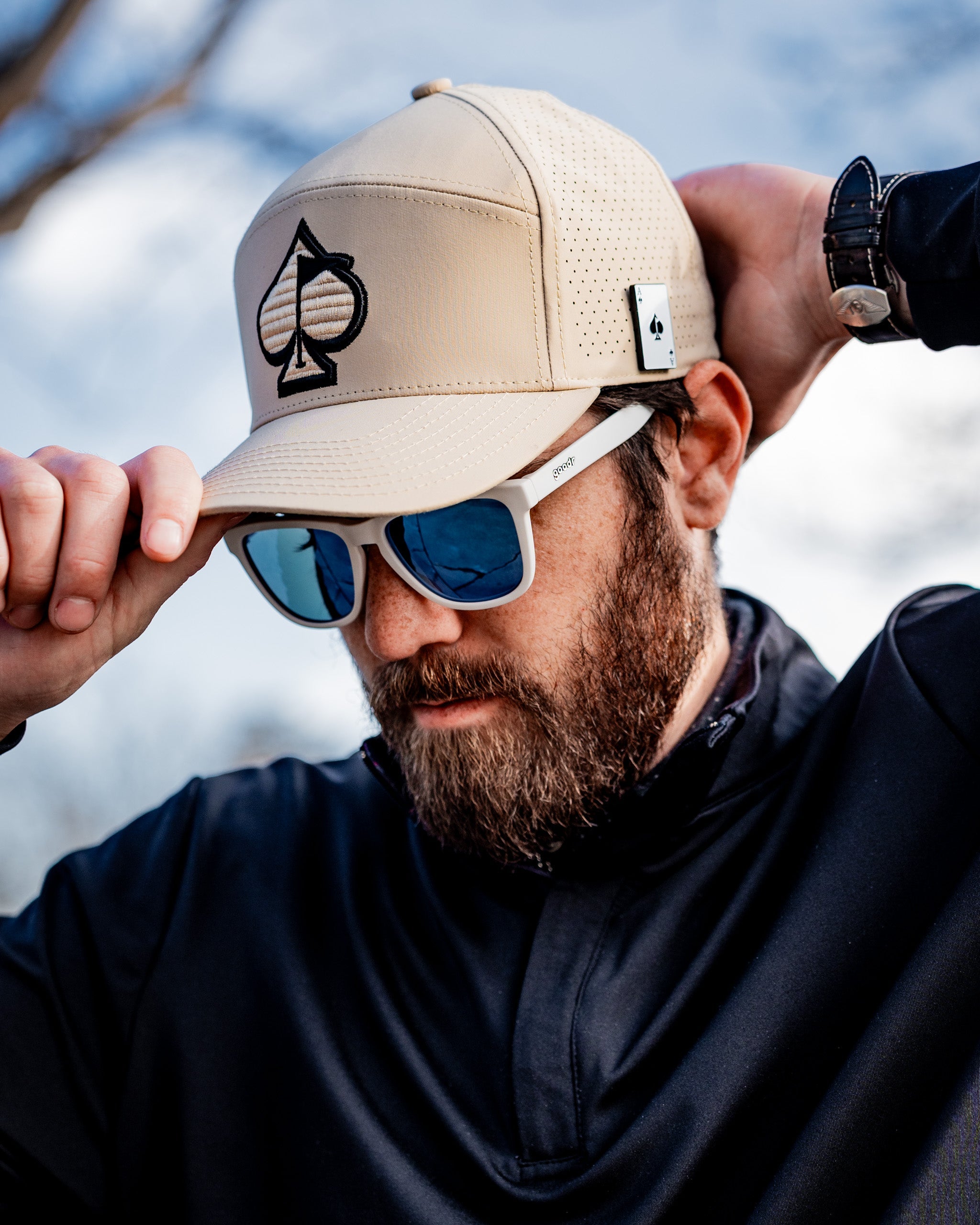 Tradesman Hat in Sand color, featuring a wide brim and adjustable chin strap, displayed against a neutral background.