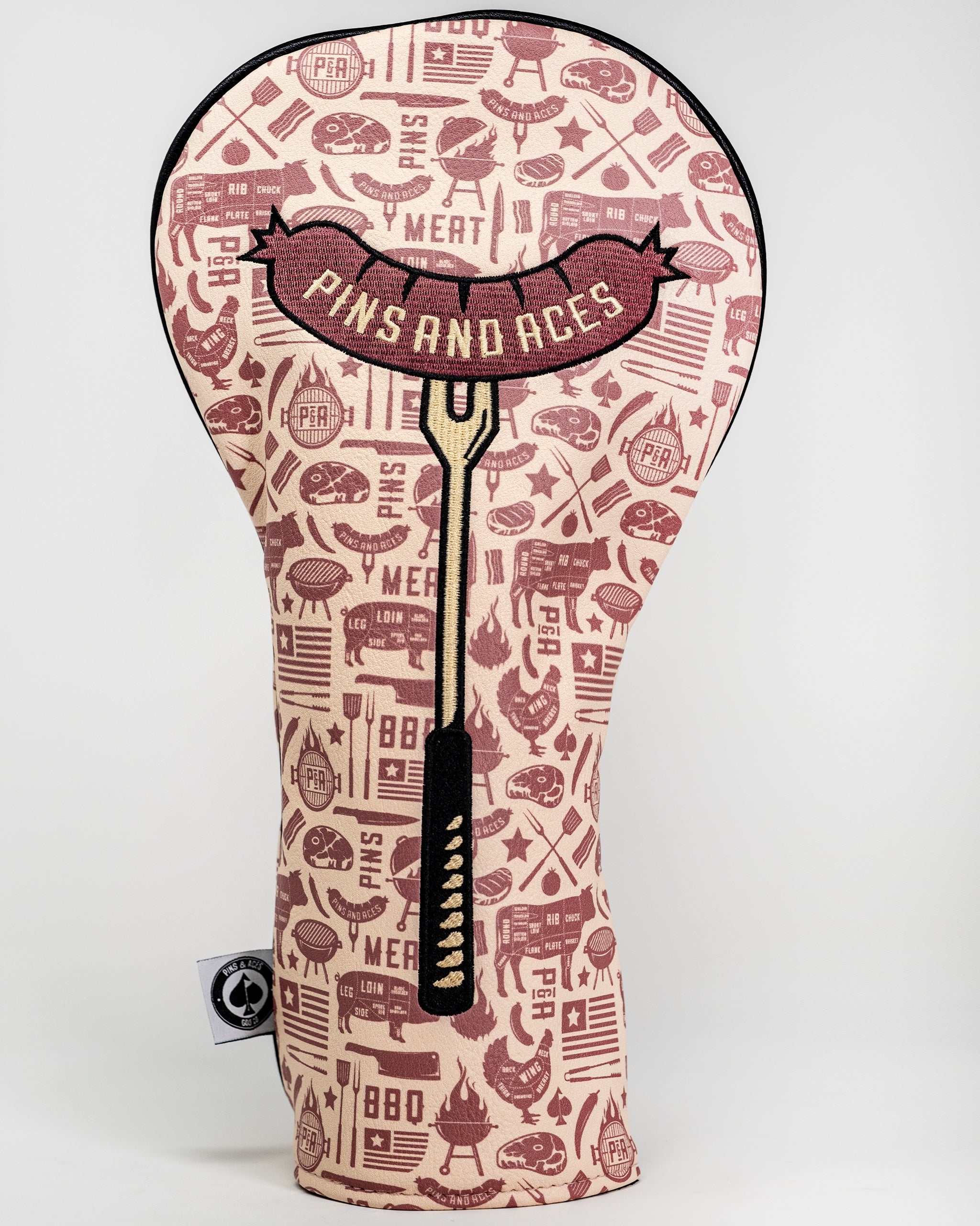 "BBQ Links Driver Headcover featuring a playful barbecue grill design with vibrant colors, perfect for golf enthusiasts."