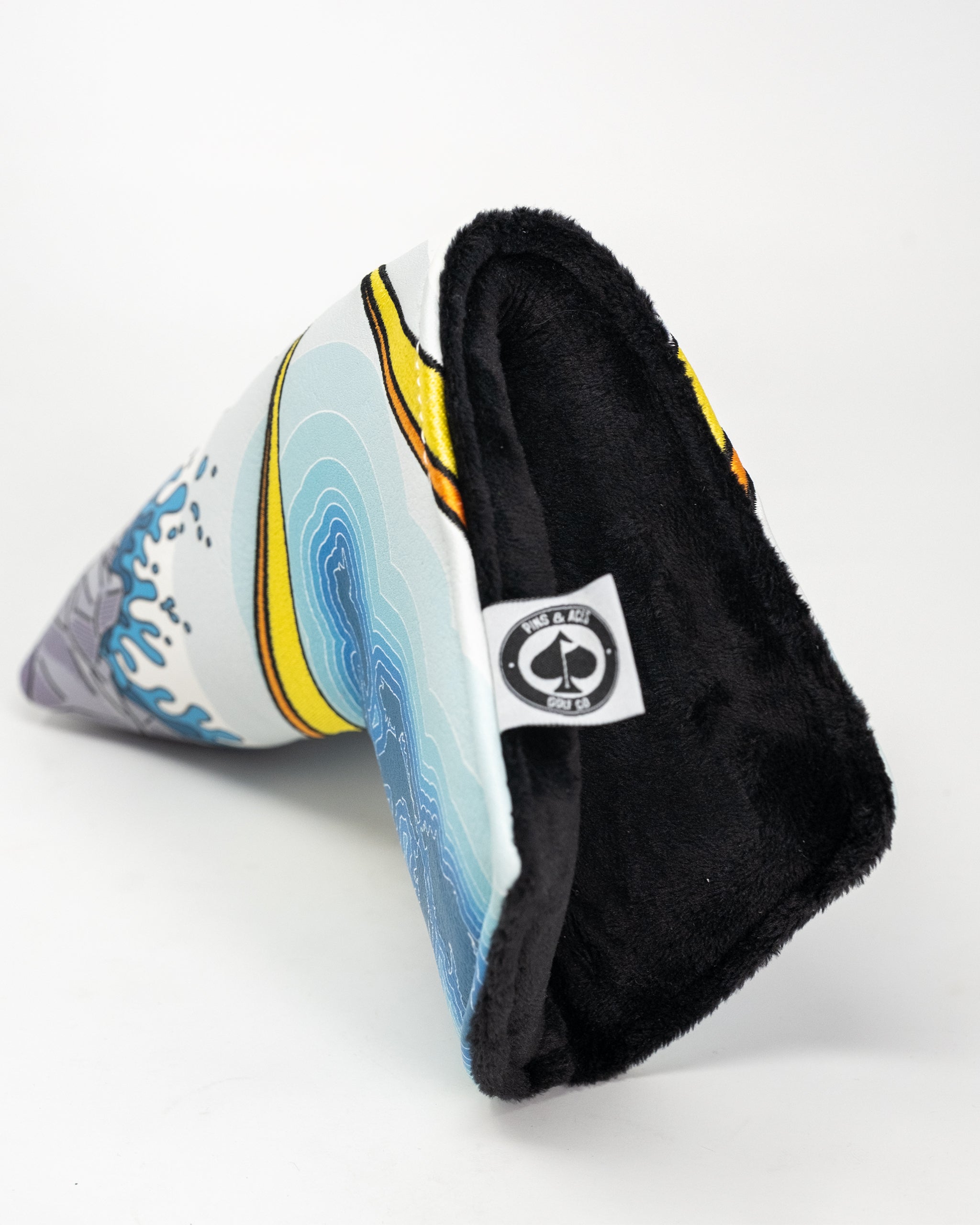 Great Lakes Blade Putter Cover featuring a colorful design and embroidered logo, ideal for golf enthusiasts seeking protection and style for their putter.