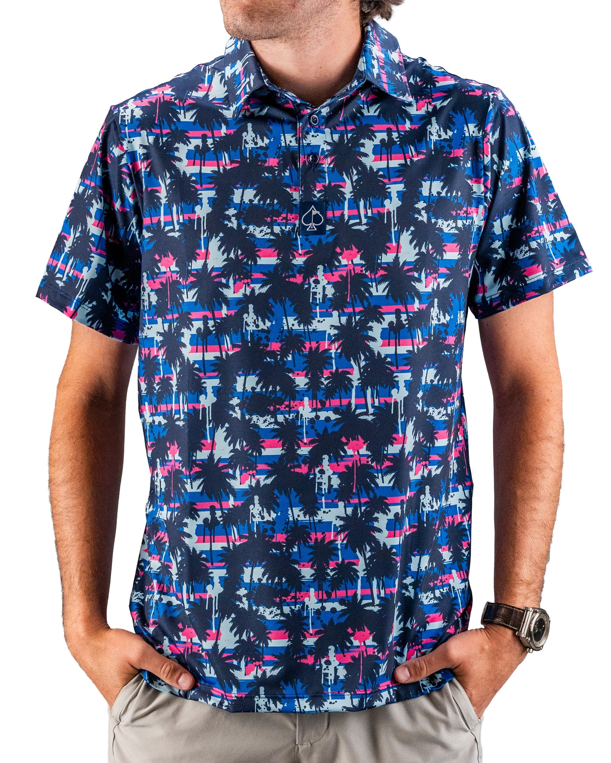 Bright, bold golf shirt featuring navy, pink, and blue palm trees with a graffiti-inspired pattern, perfect for standing o...