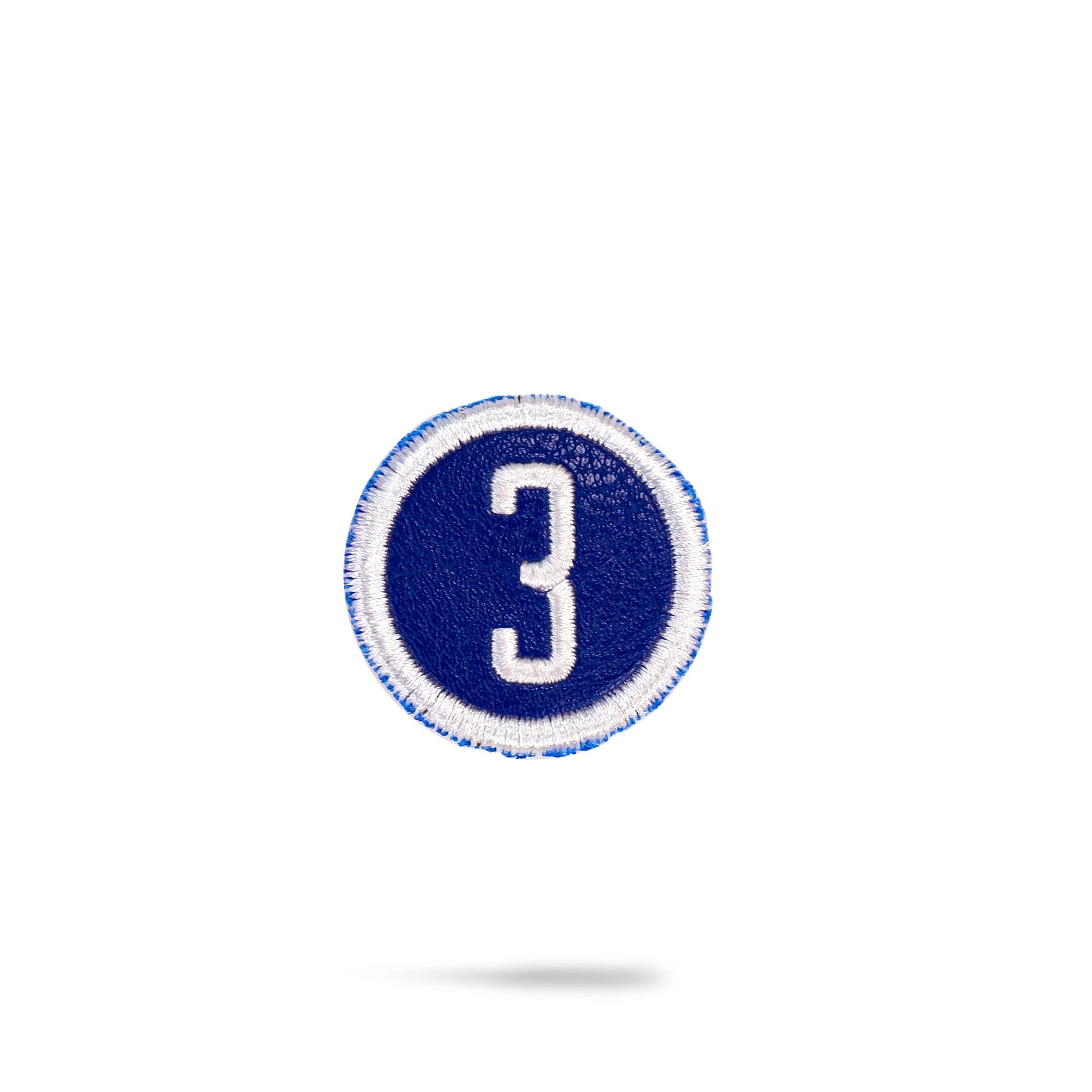 Blue headcover patch featuring a sleek design, ideal for customizing golf accessories.