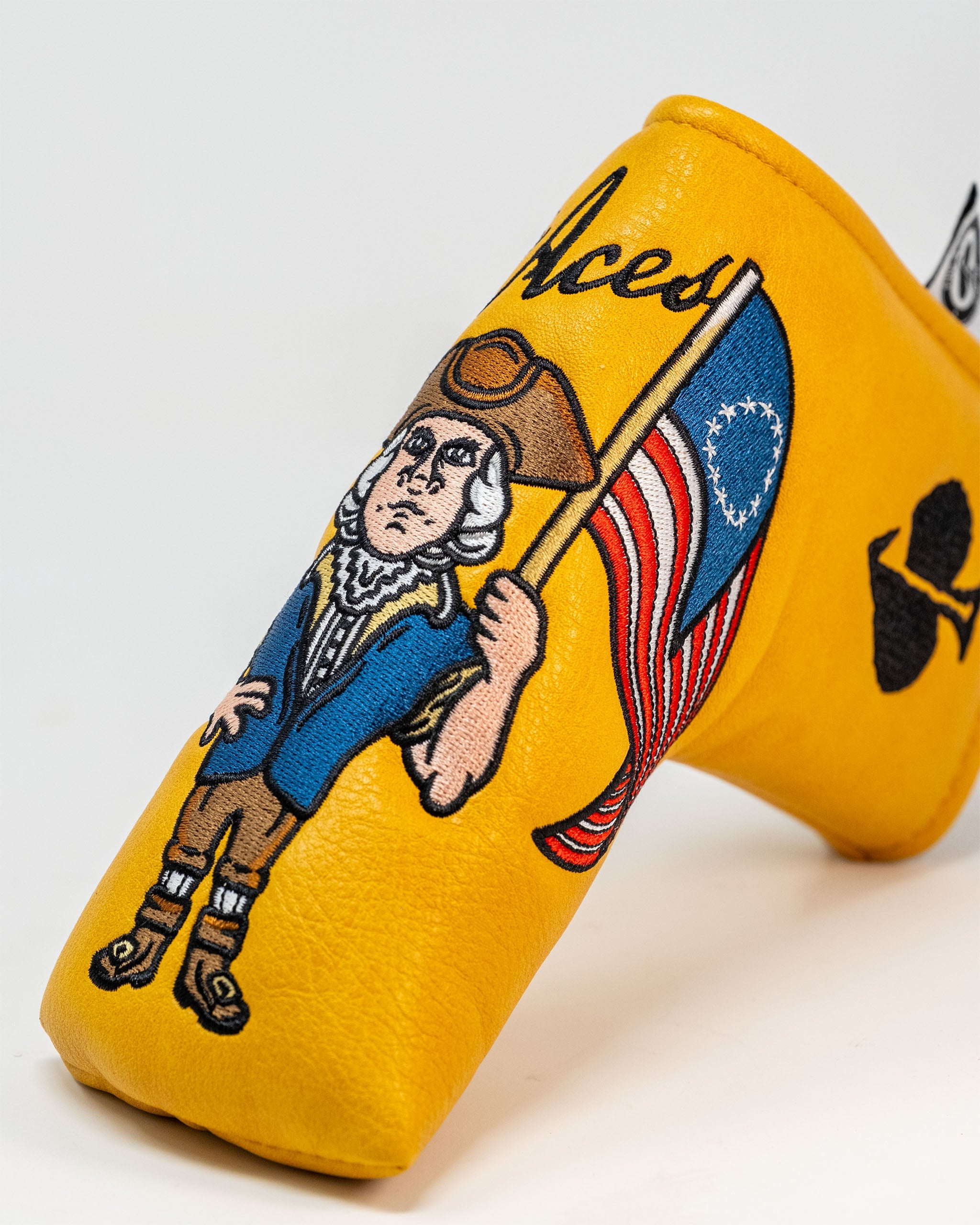 Patriot Blade Putter Cover featuring a stars and stripes design in red, white, and blue.