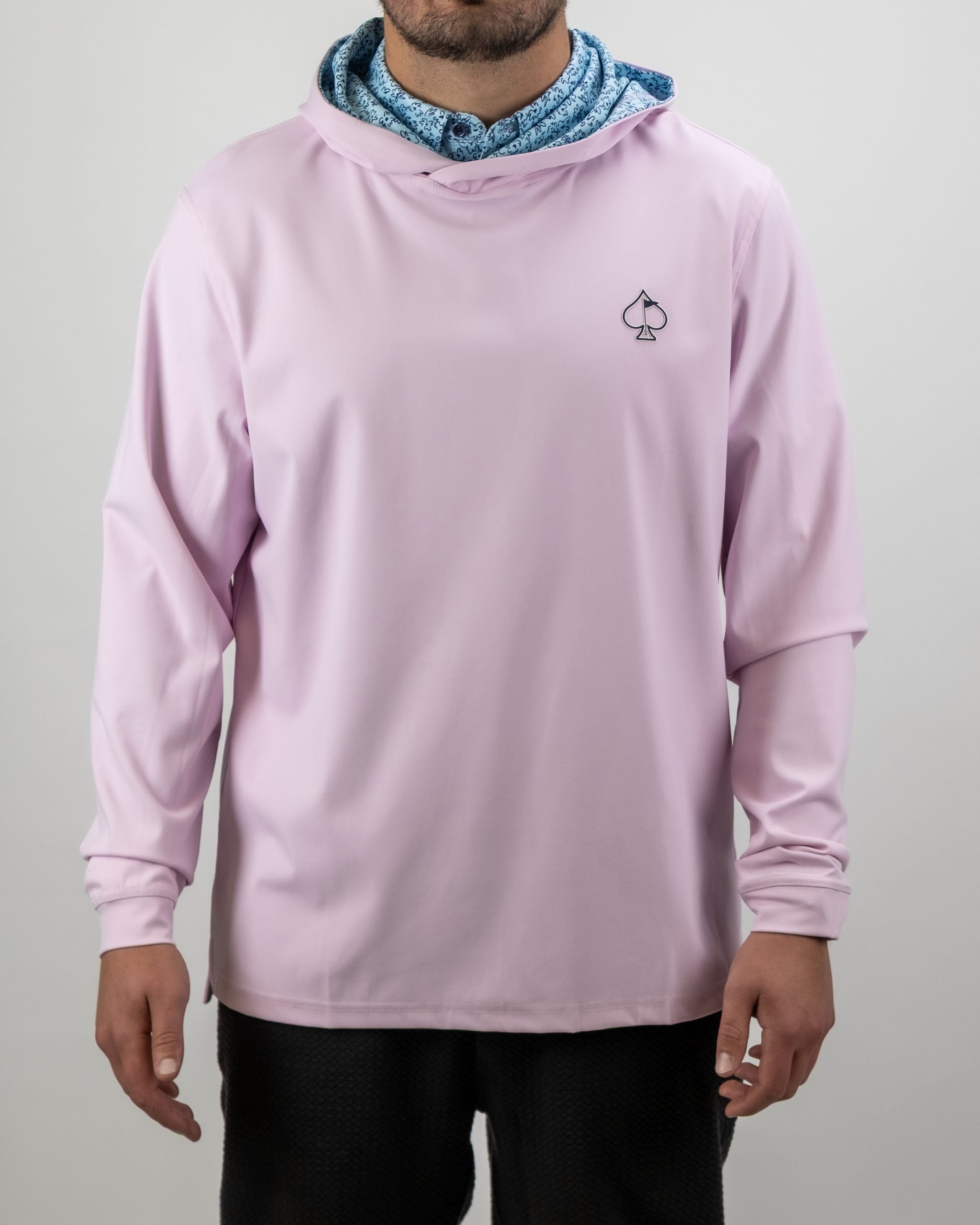 Men's performance golf hoodie in light pink with a blue flower doodle hood, featuring a small logo on the chest.