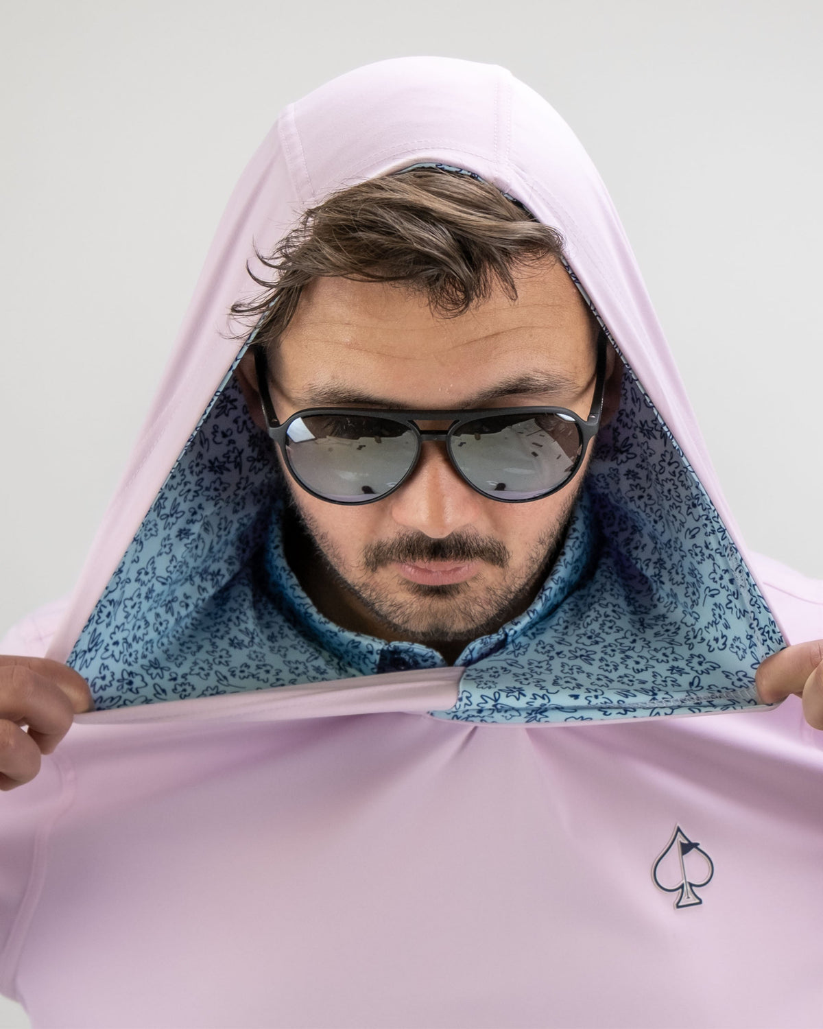 Performance Golf Hoodie in Flower Doodle Blue, featuring a stylish hood and unique floral lining, perfect for golfers.