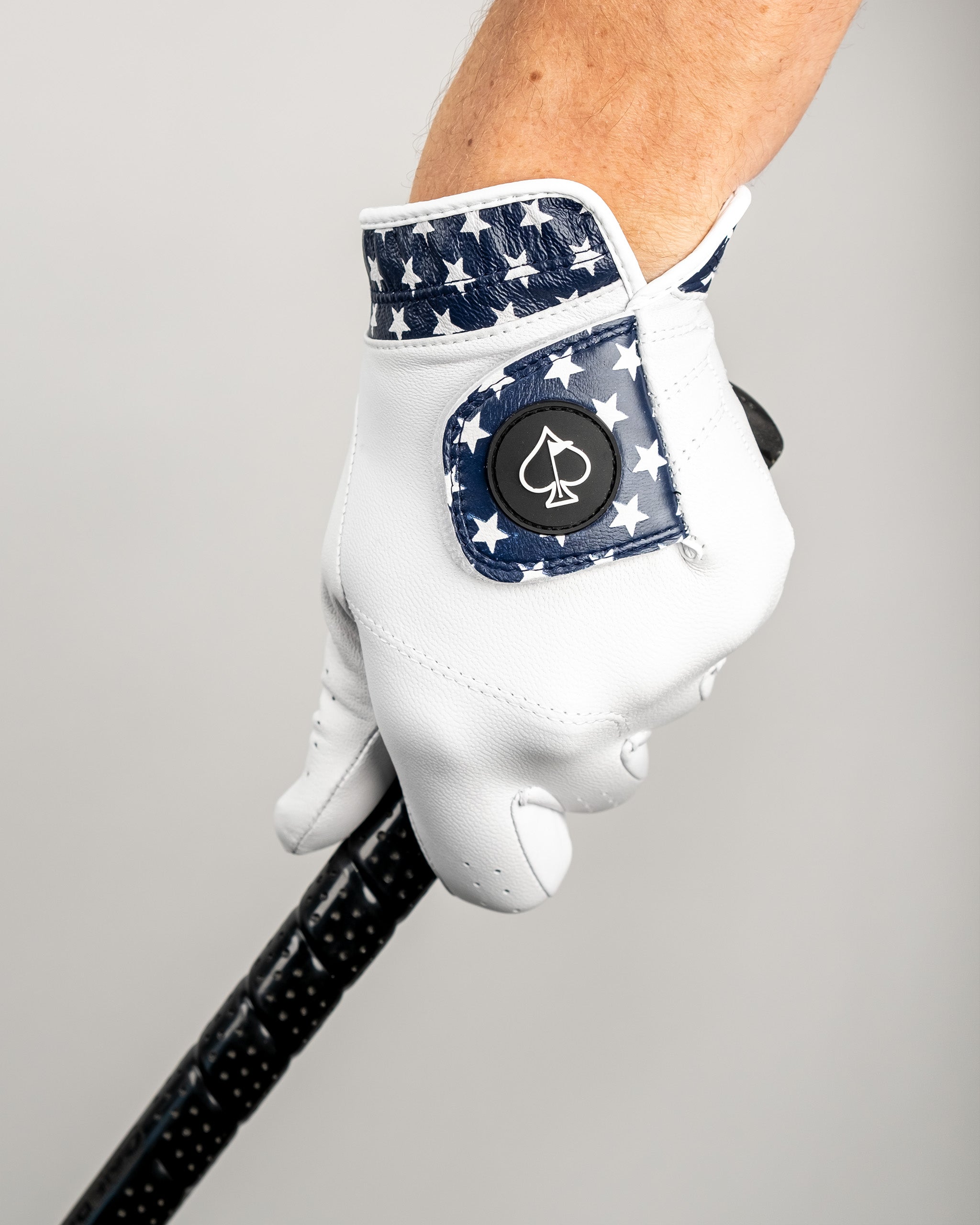 Premium Tour Glove featuring a stars design, showcasing its grip and stylish appearance.