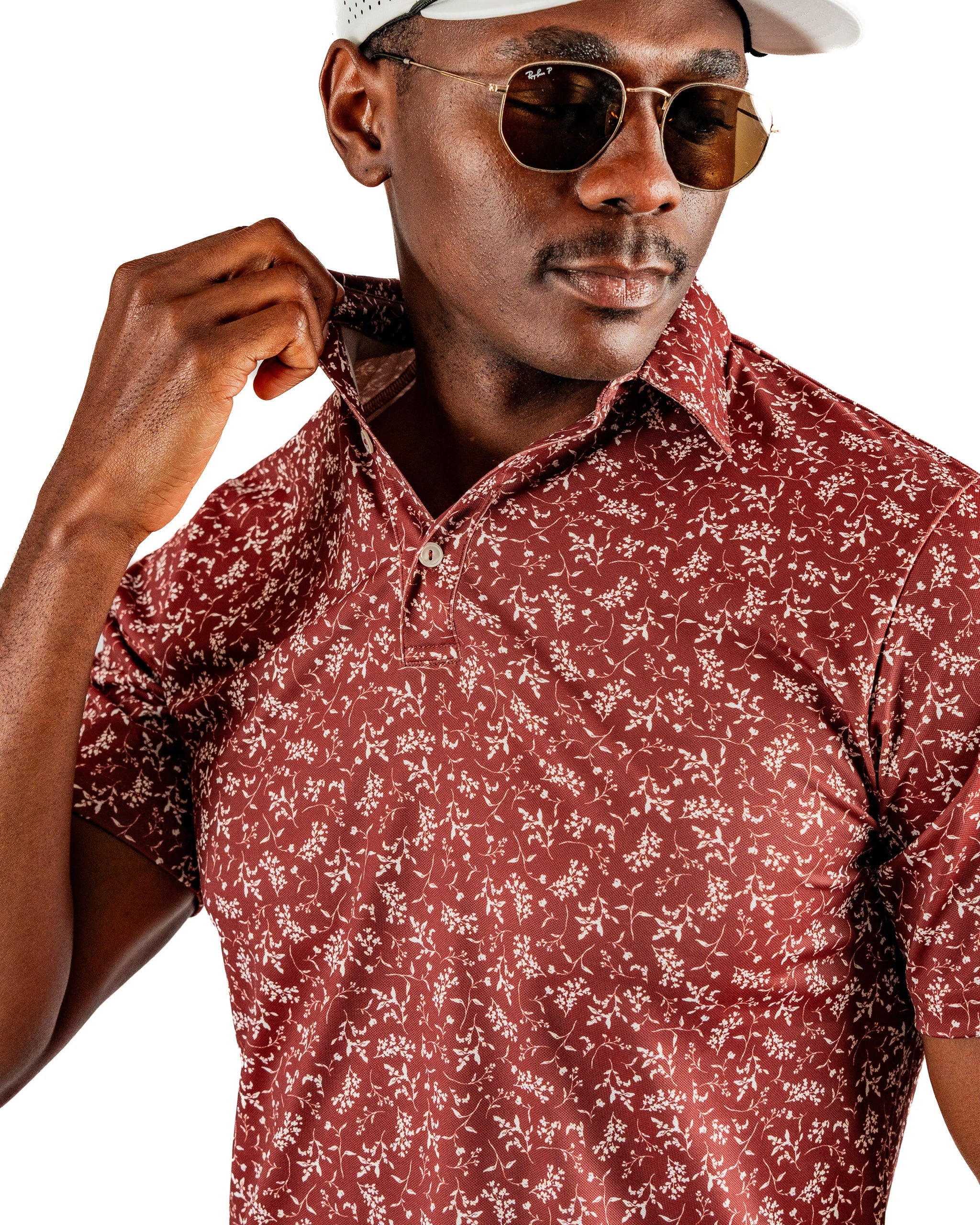 Men's autumn floral golf polo shirt in rich burgundy, featuring a stylish collar and a modern fit, perfect for standout performance.
