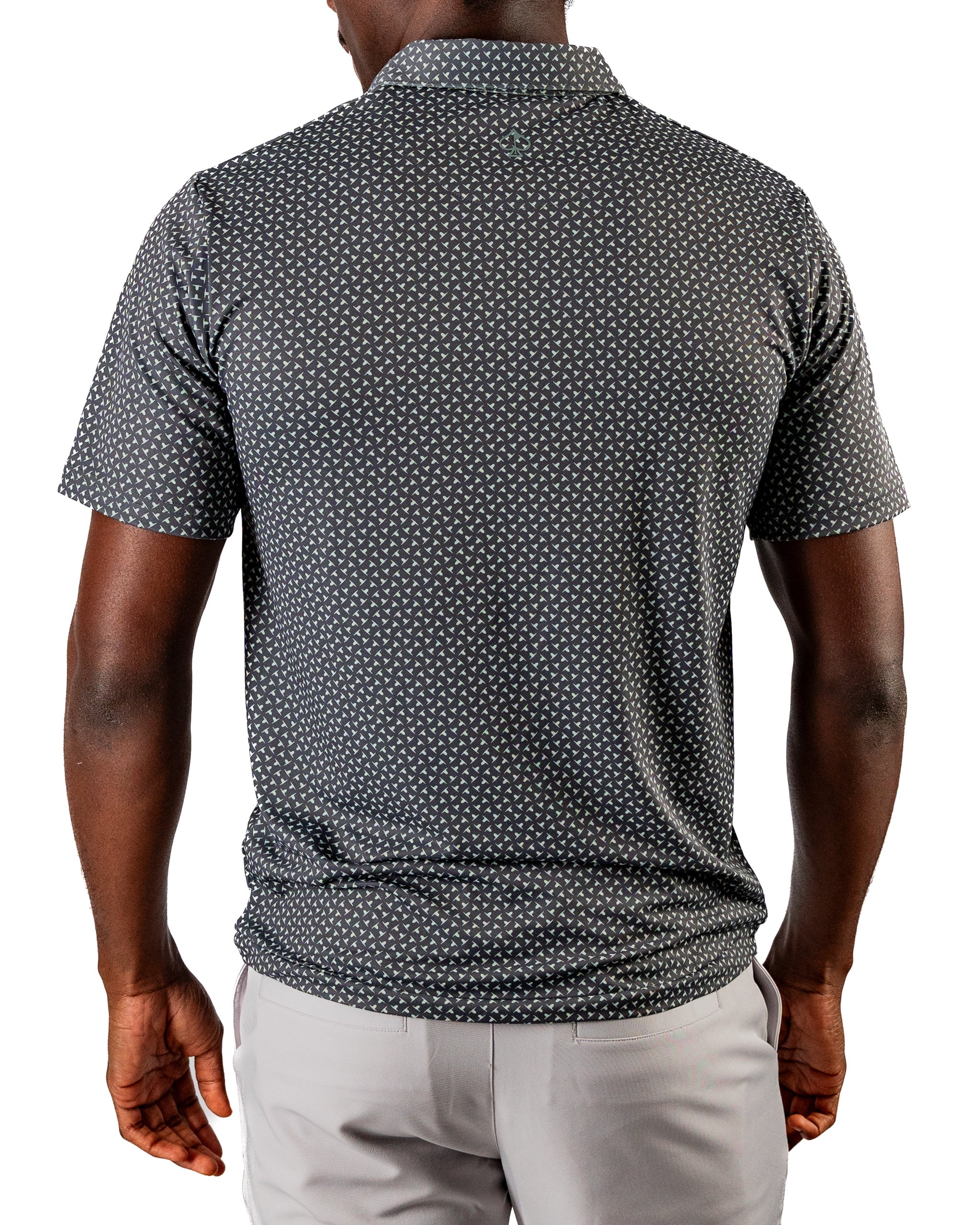 Men's short-sleeve golf shirt in dark gray with a subtle jade drop pattern, showcasing a modern fit from the back.