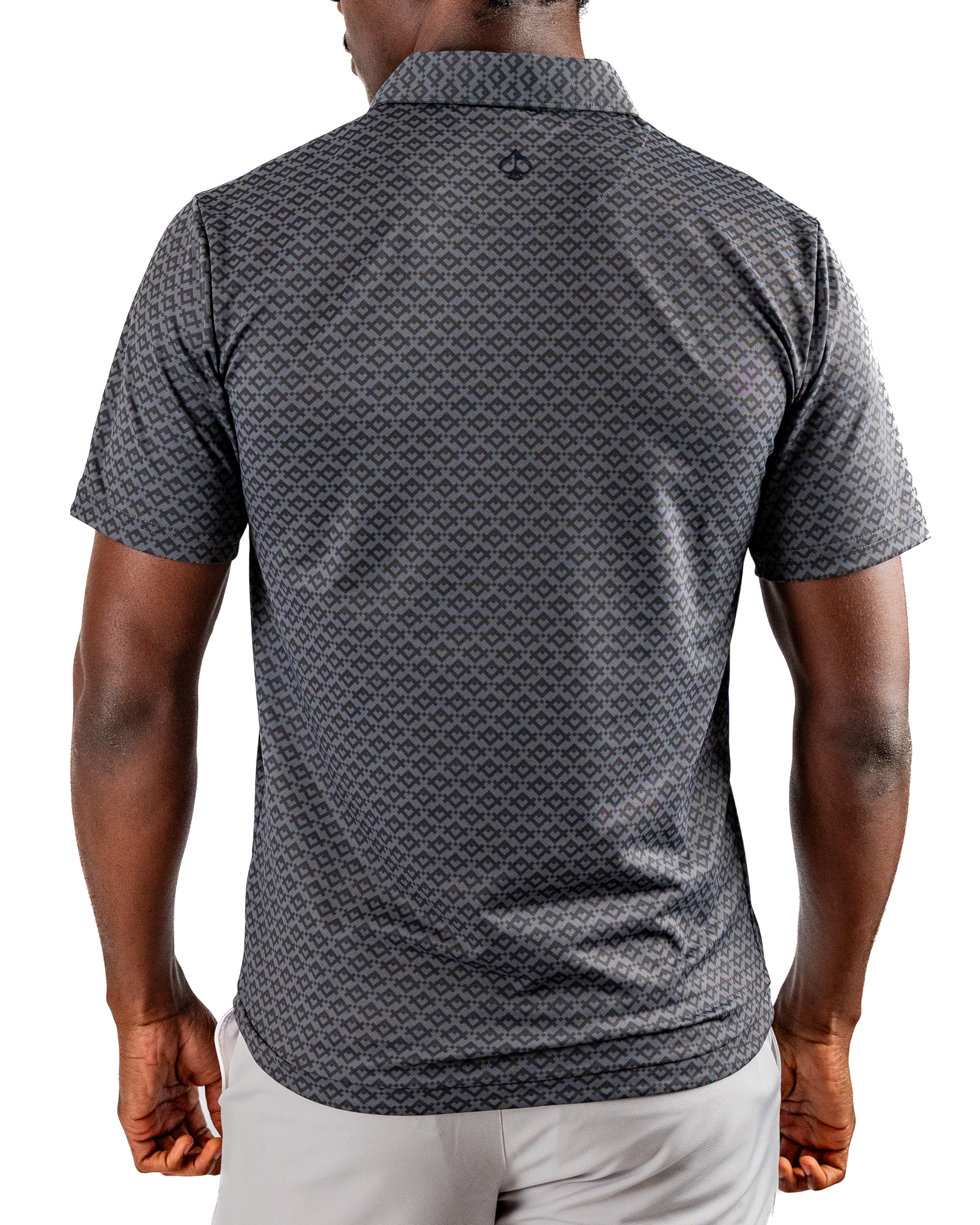 Men's short-sleeve golf shirt in slate gray featuring a subtle mosaic pattern, designed for comfort and style on the course.