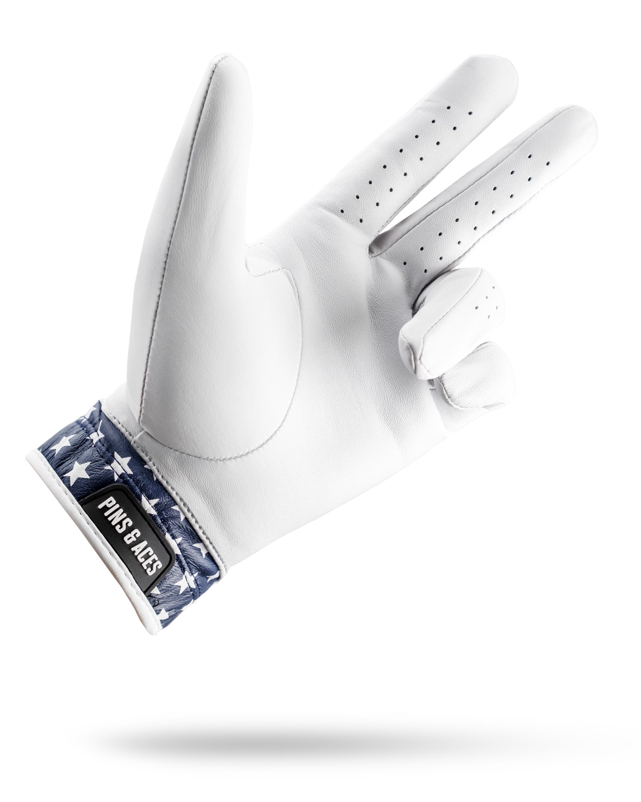 Premium Tour Glove featuring a white leather design with a star-patterned cuff, ideal for golfers seeking style and performance.