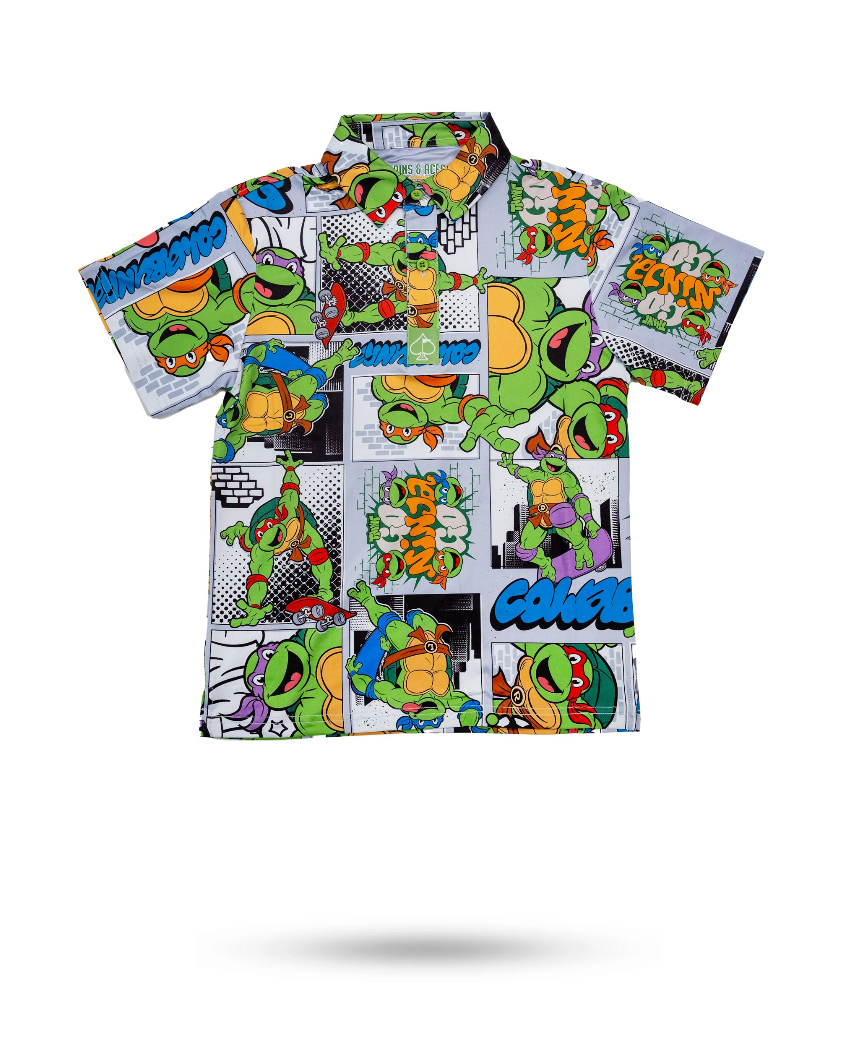 Youth shirt featuring a vibrant Teenage Mutant Ninja Turtles comic strip design with colorful graphics and playful patterns.