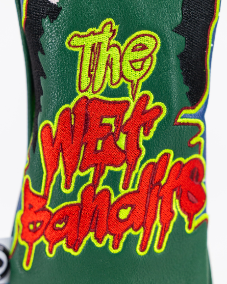 Bold green fairway cover featuring vibrant "Wet Bandits" embroidery, perfect for golfers wanting to make a statement.