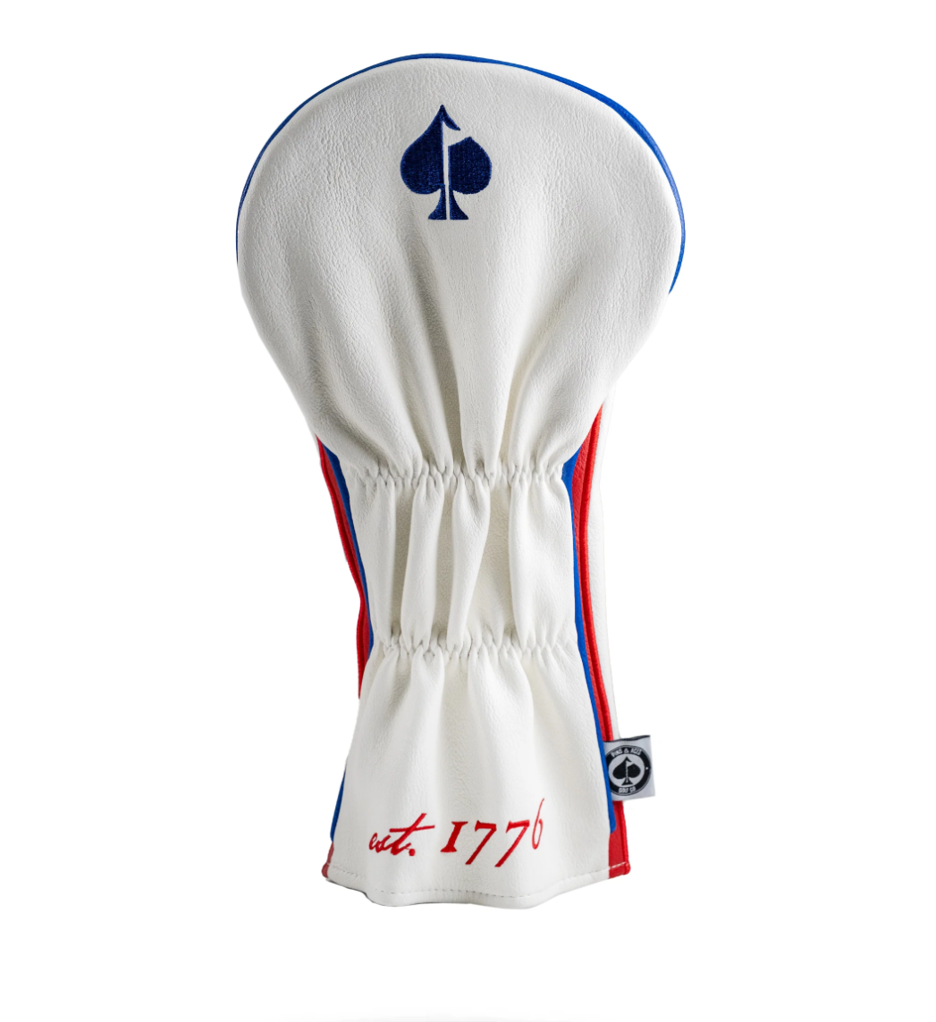 Betsy Ross driver cover featuring a blue spade logo and red and blue accents, celebrating American heritage in golf.