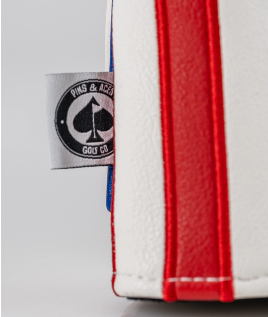 Betsy Ross driver cover featuring a bold red, white, and blue design with a logo tag from Pins and Aces Golf Co.