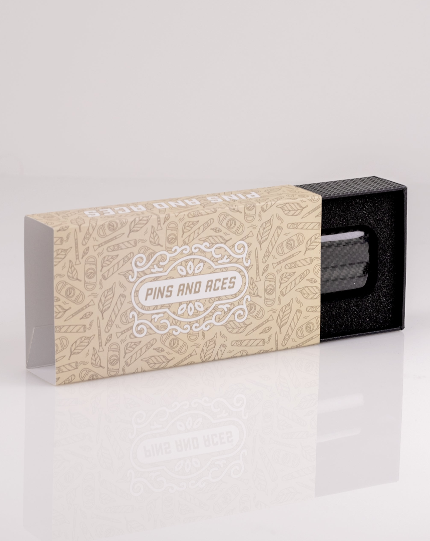 Carbon fiber cigar case with two slots, elegantly packaged, ideal for golfers who appreciate style and functionality.