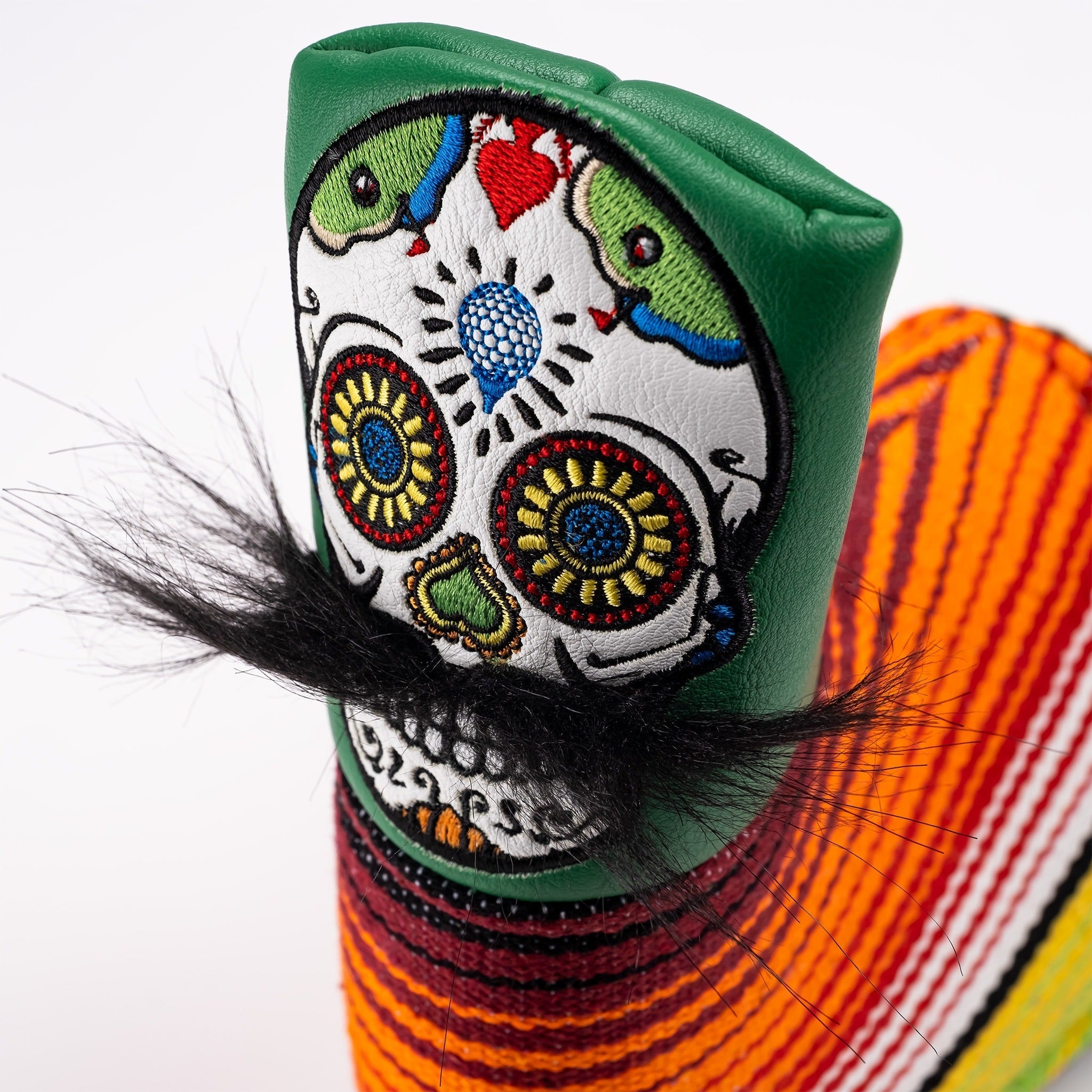Green mustache sugar skull blade putter cover with intricate designs and vibrant colors.