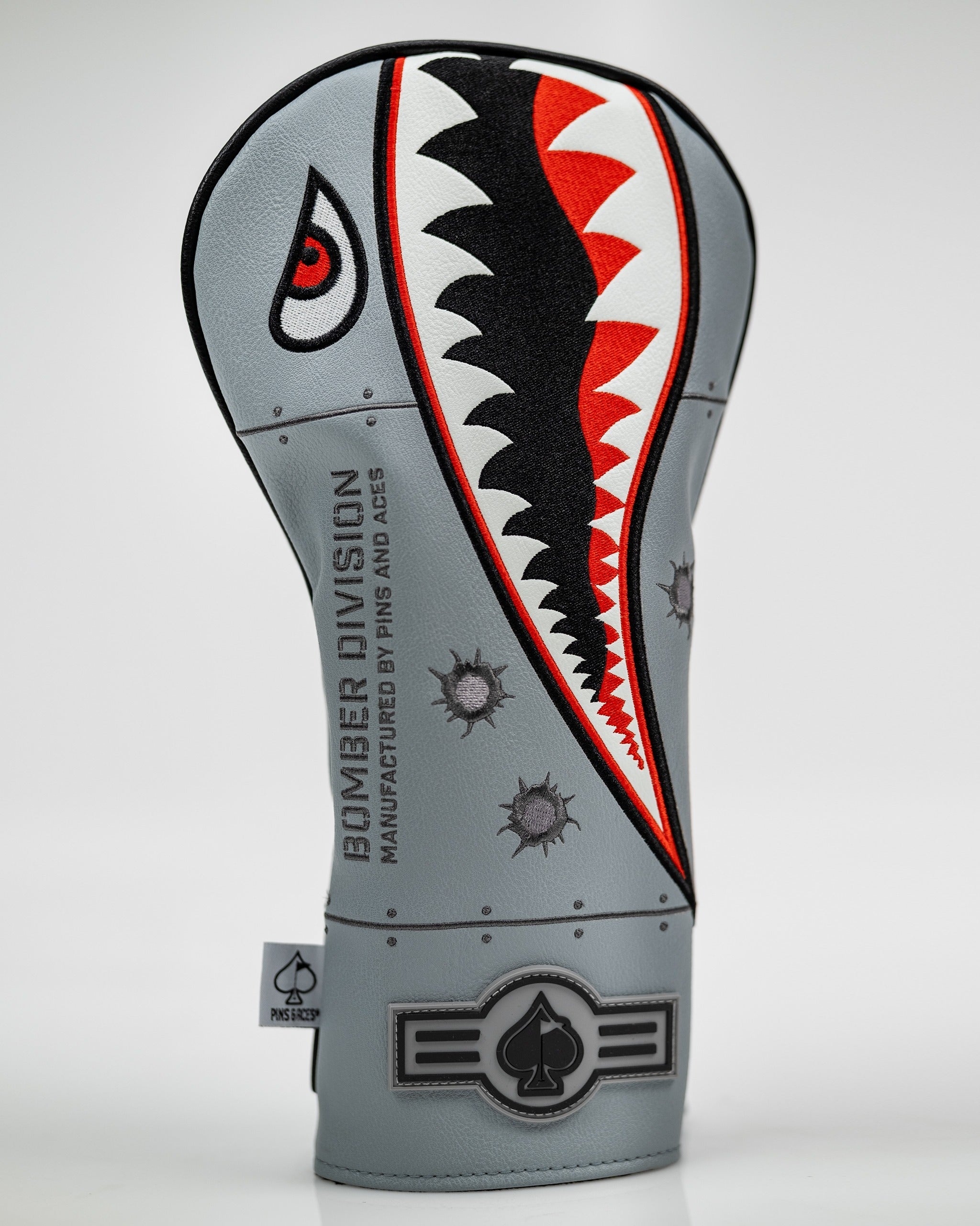 Bold bomber-themed driver cover featuring a shark mouth design, perfect for golfers wanting to stand out on the course.