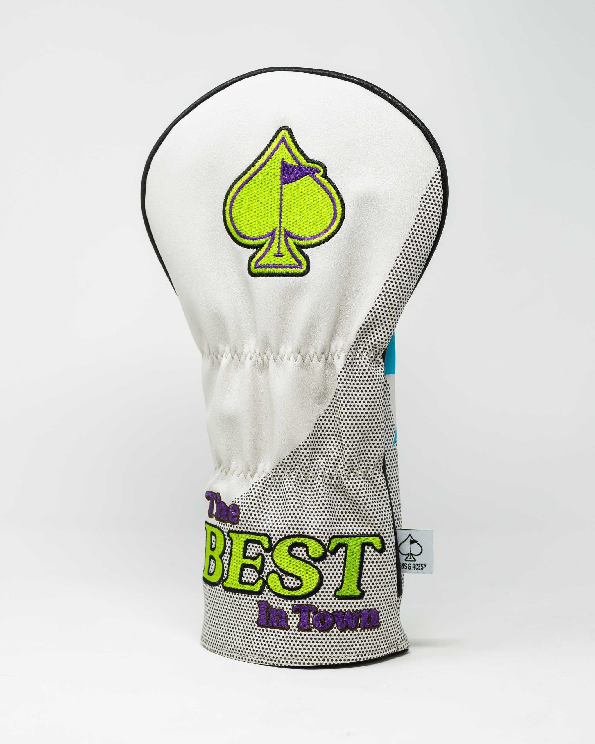 Bold golf driver cover featuring a vibrant green spade logo and the phrase "The BEST in Town" in eye-catching colors.
