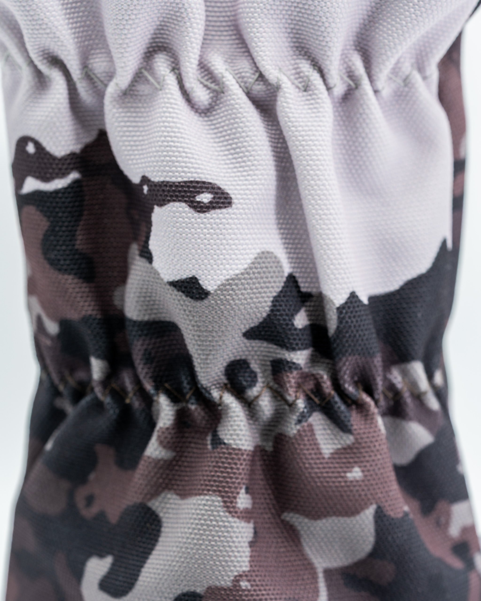 Camo-patterned driver cover featuring a bear design, perfect for golfers seeking a unique and bold accessory.