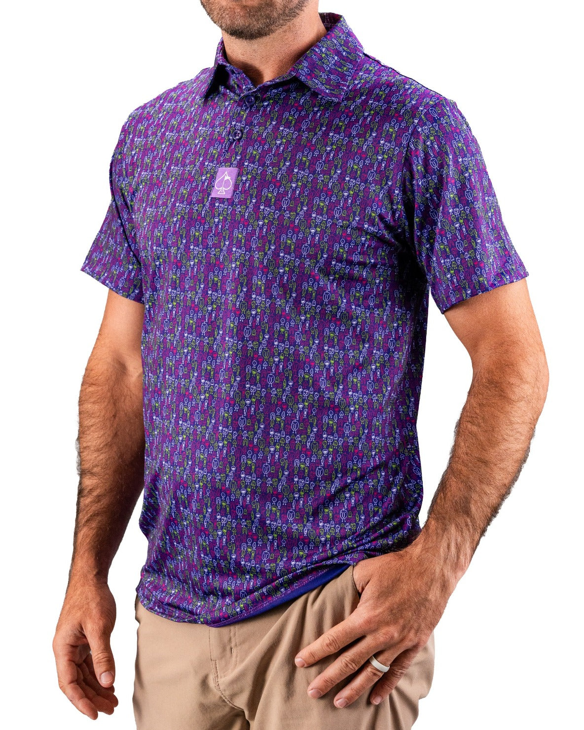 Men's purple golf shirt with a colorful, bold pattern of small golf clubs and tees, featuring a spade logo patch.
