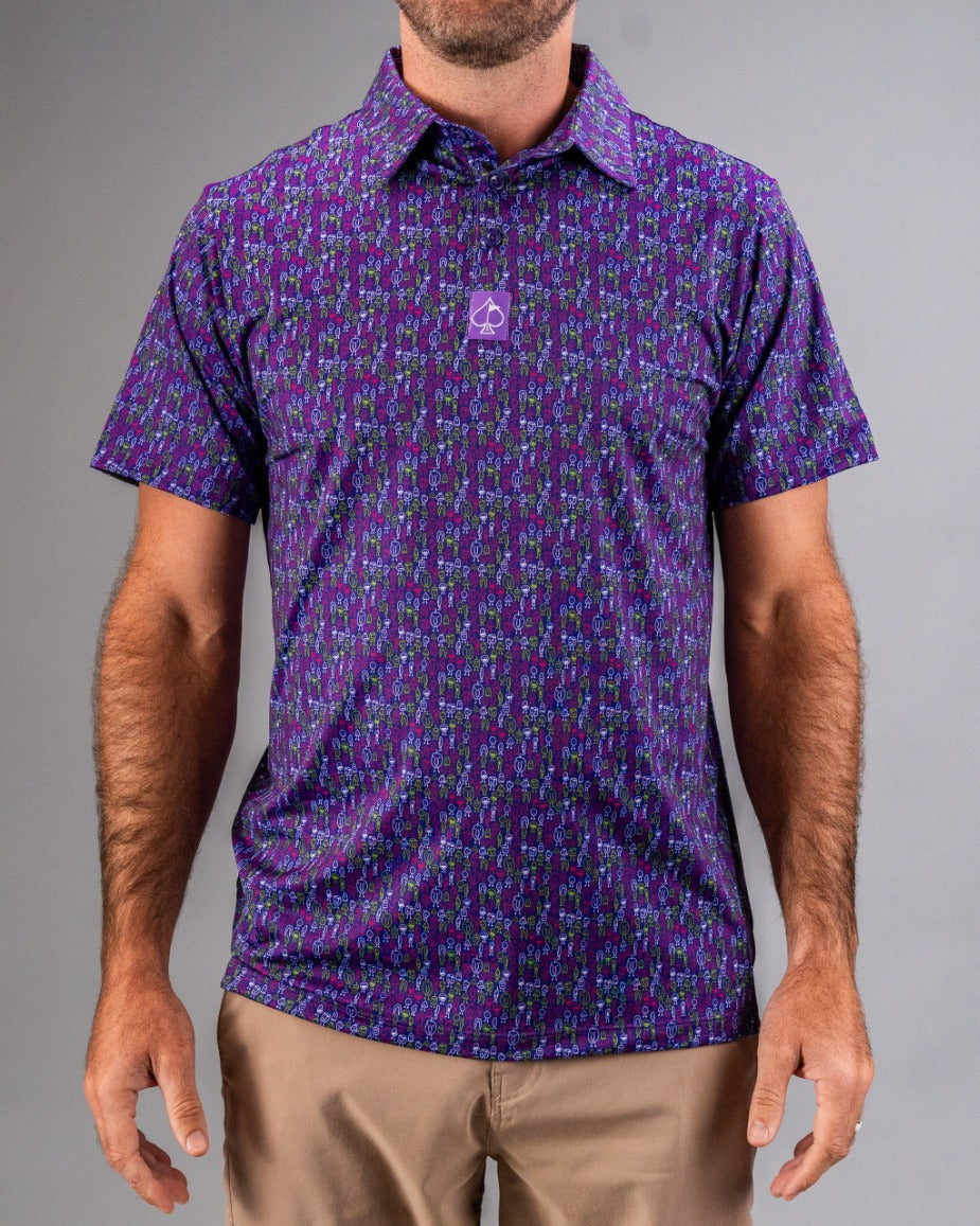 Bold purple golf shirt with a colorful, intricate pattern, and a small spade logo on the chest, perfect for standing out o...