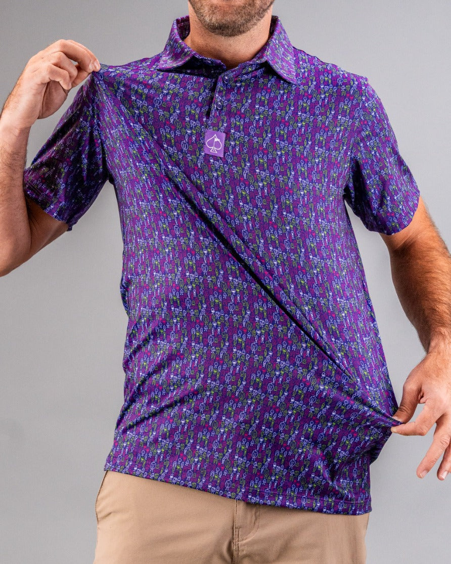 Man wearing a bold purple golf shirt with a colorful, intricate pattern, highlighting unique golf apparel for standout pla...