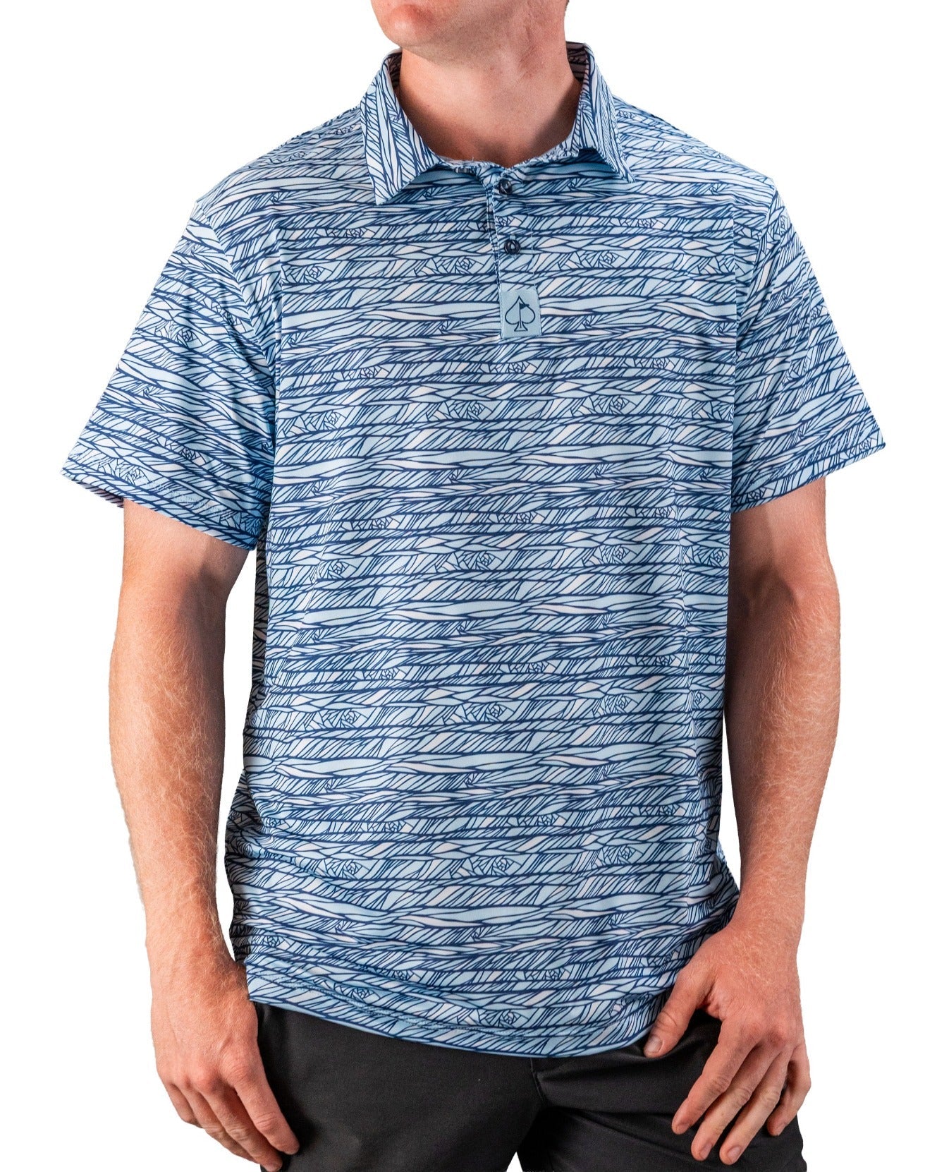 Men's blue and white patterned golf polo with a spade logo, featuring bold, intricate line designs for standout style on t...