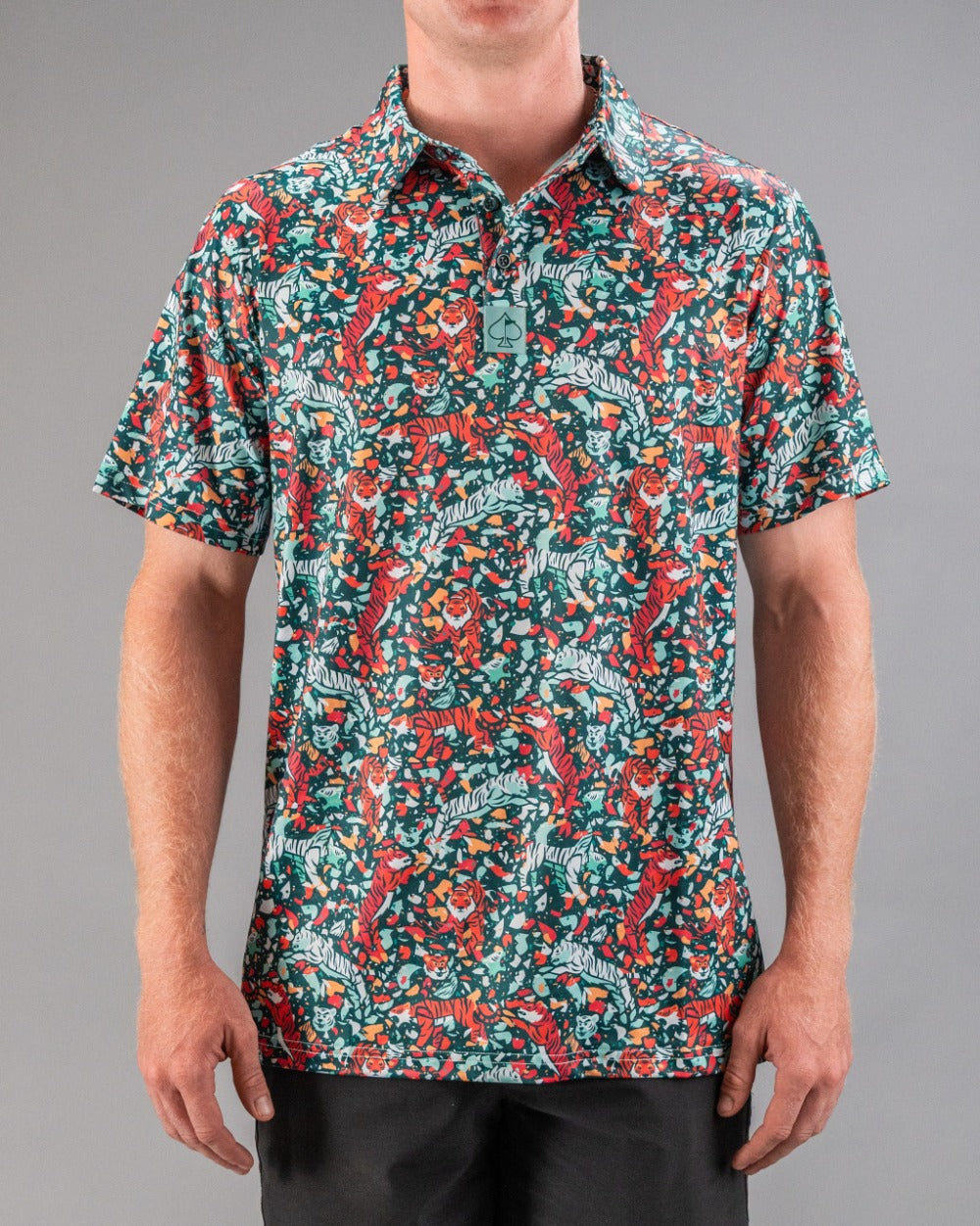 Bold teal golf shirt featuring a vibrant tiger and floral pattern, designed for golfers who want to stand out on the course.