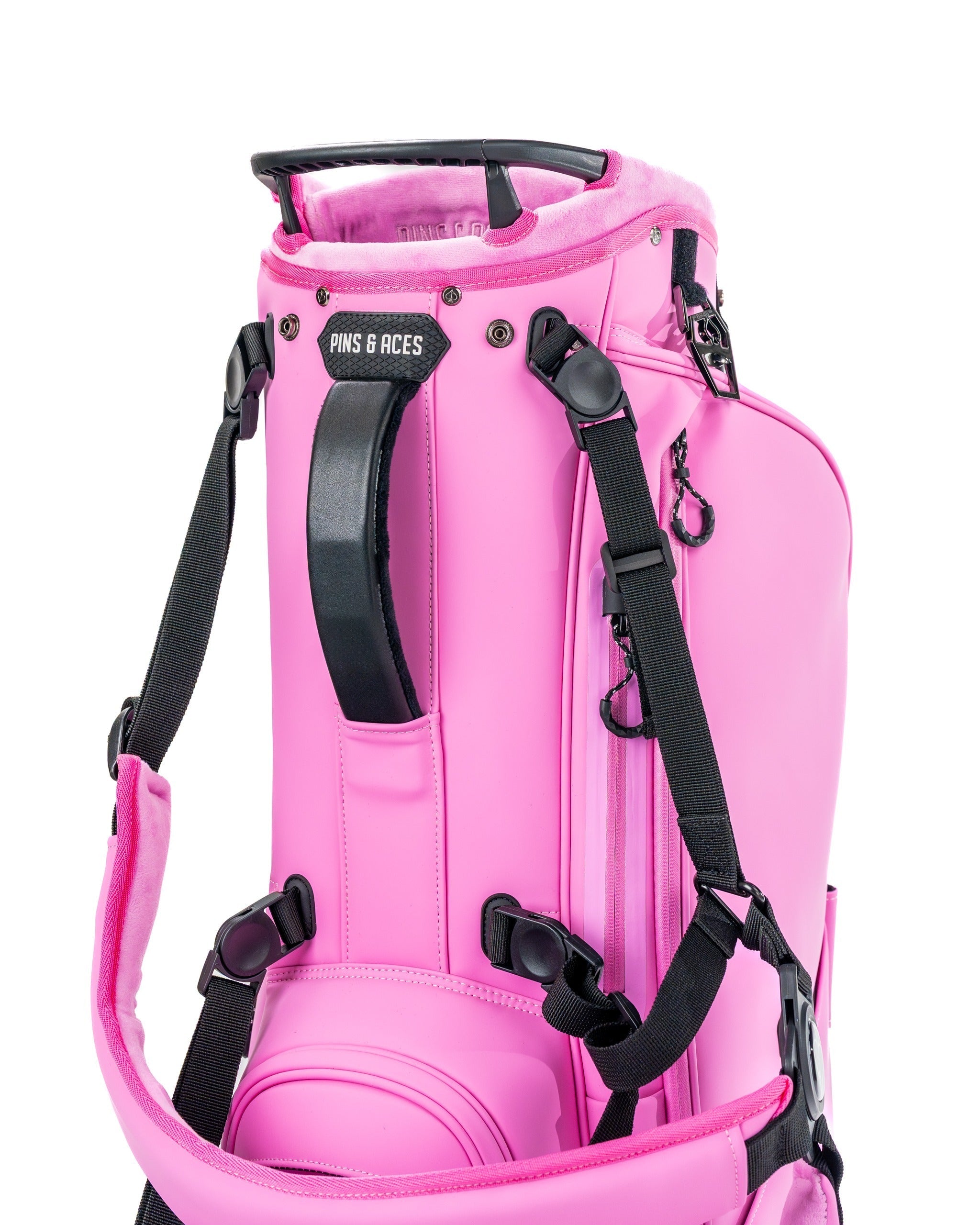 Bold pink Player Preferred Golf Bag from Pins & Aces featuring adjustable straps and a sleek design for stylish golfers.