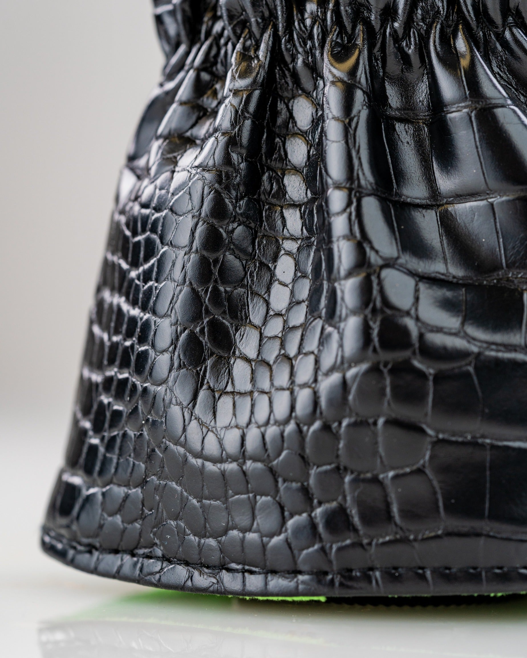 Black T-Rex driver cover featuring a textured crocodile pattern, designed for a bold and stylish golf accessory.