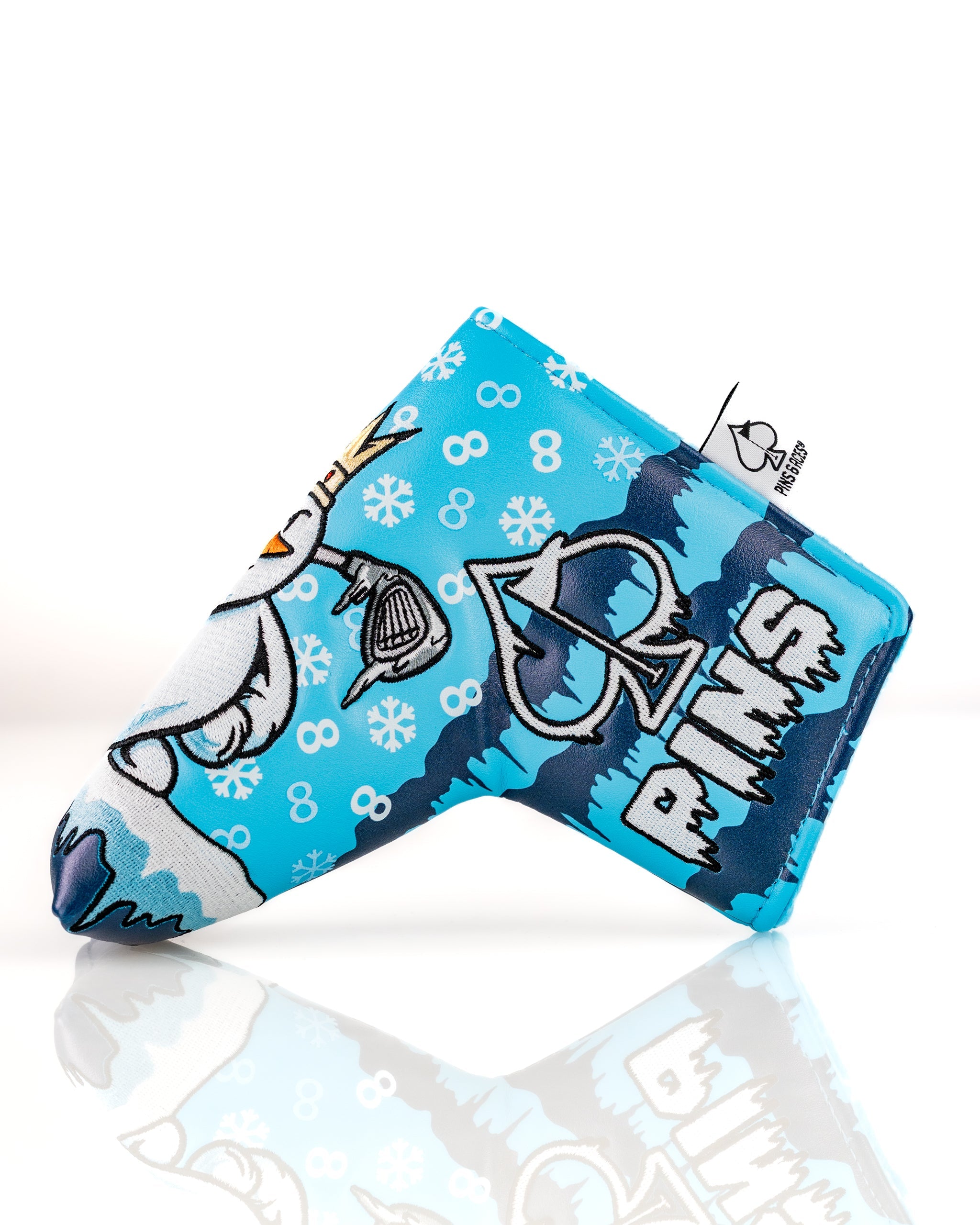 Colorful snowman blade putter cover featuring a playful design with snowflakes, perfect for adding personality on the golf course.