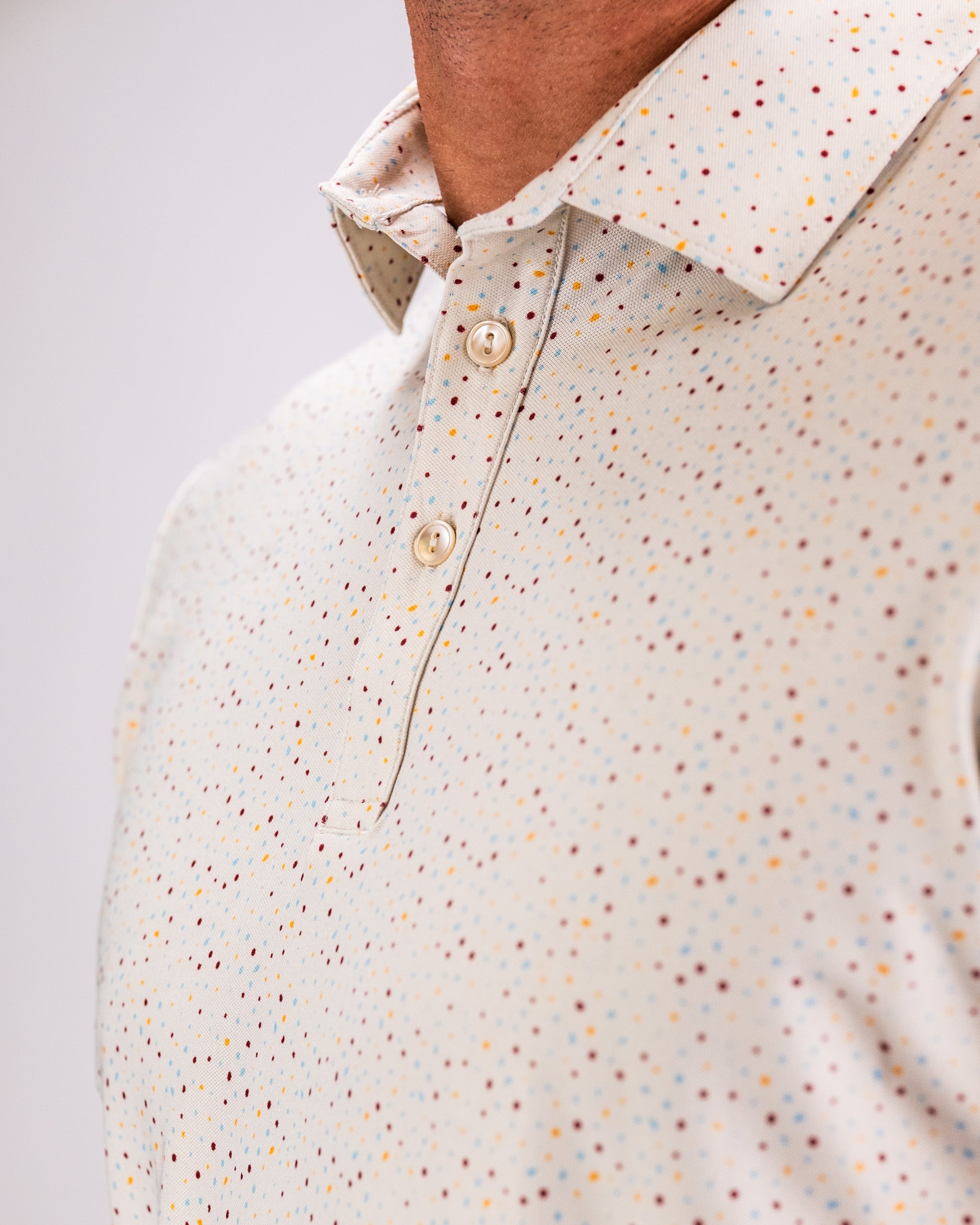 Player Preferred™ Polo in Terrazzo pattern, featuring a stylish design with a modern fit and breathable fabric.
