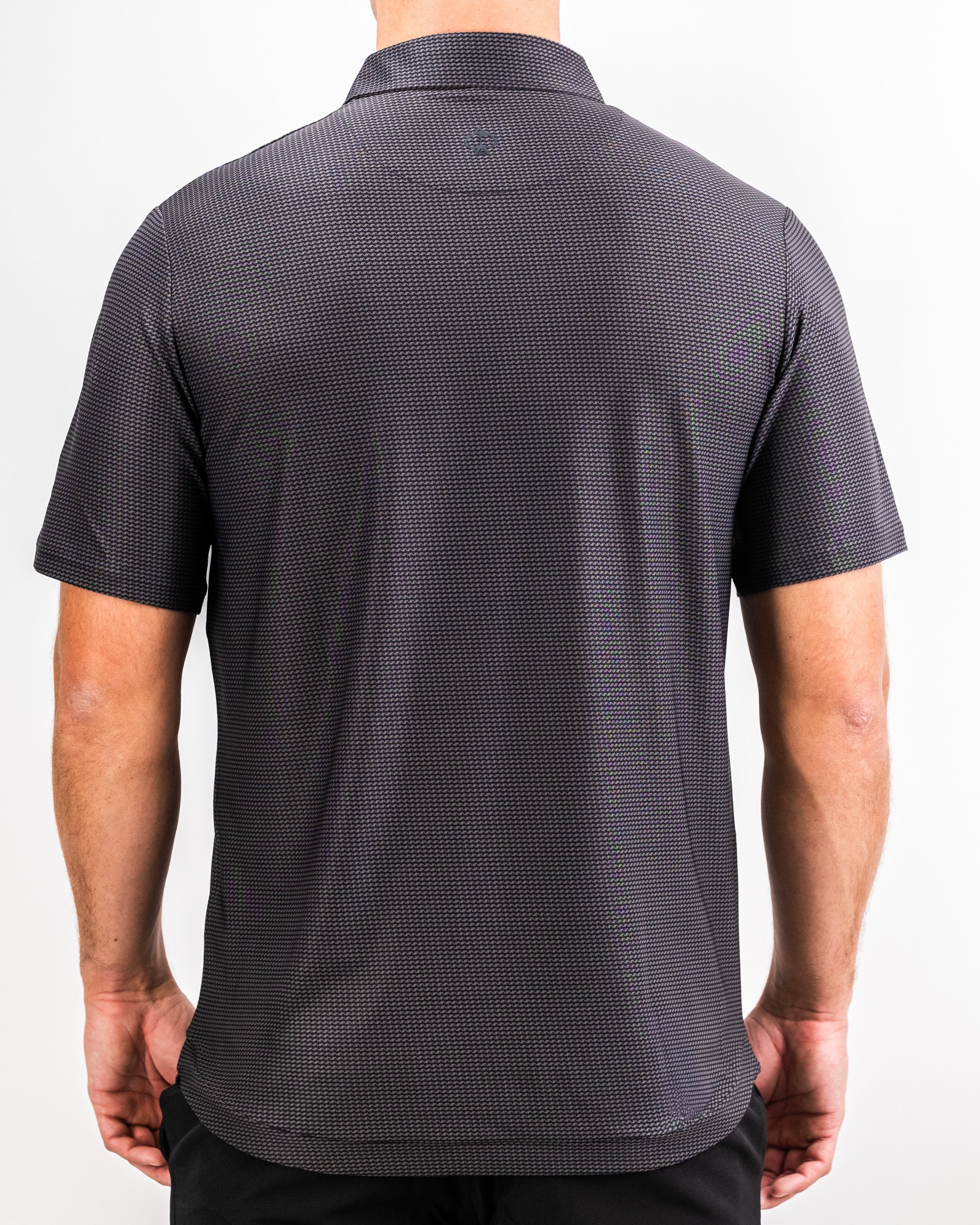 Player Preferred™ Polo in Night Wave, featuring a sleek design with a dark blue color and subtle texture, styled on a mannequin against a neutral background.
