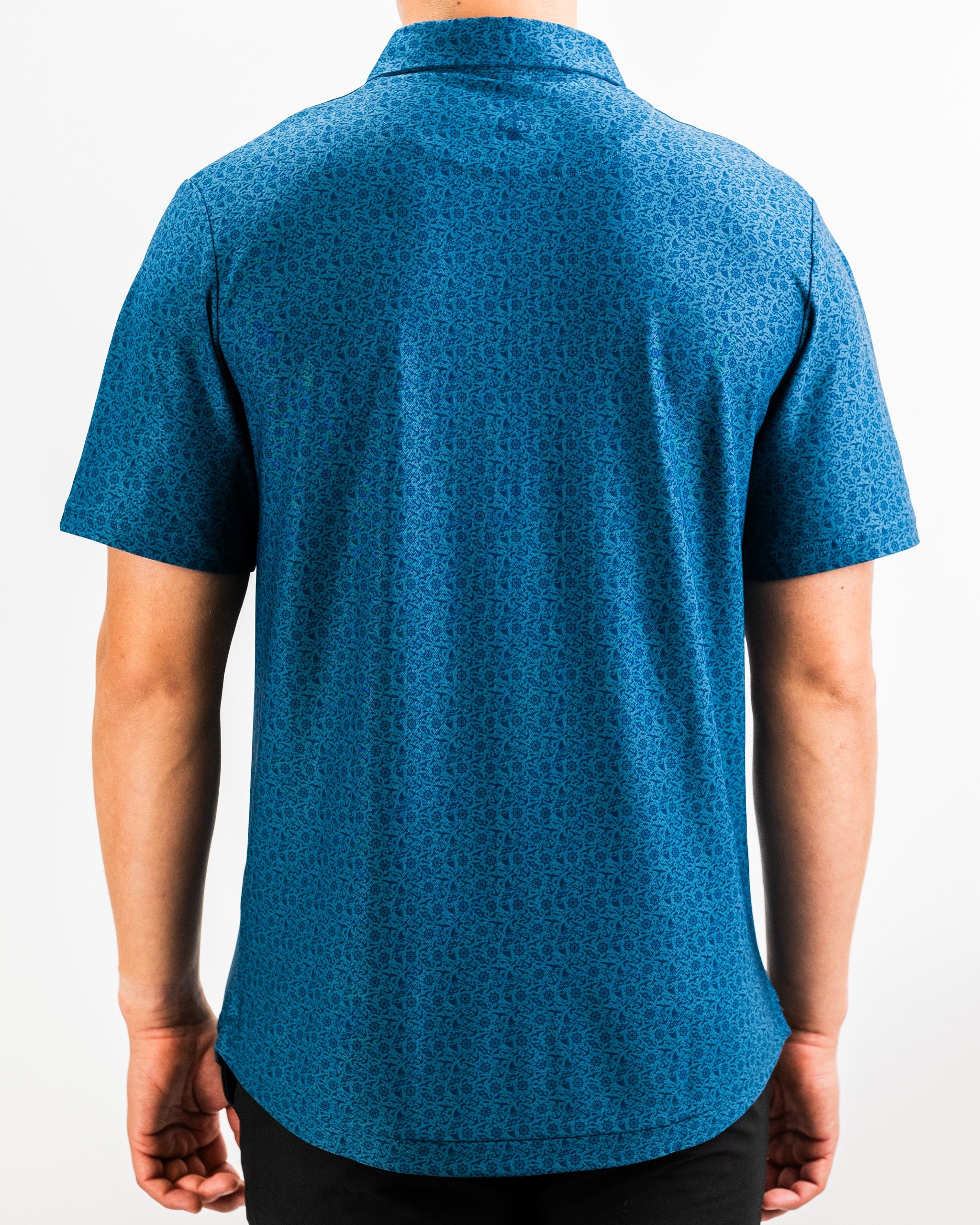Player Preferred™ Polo - The Mariner in navy blue, featuring a classic collar and short sleeves, displayed against a neutral background.