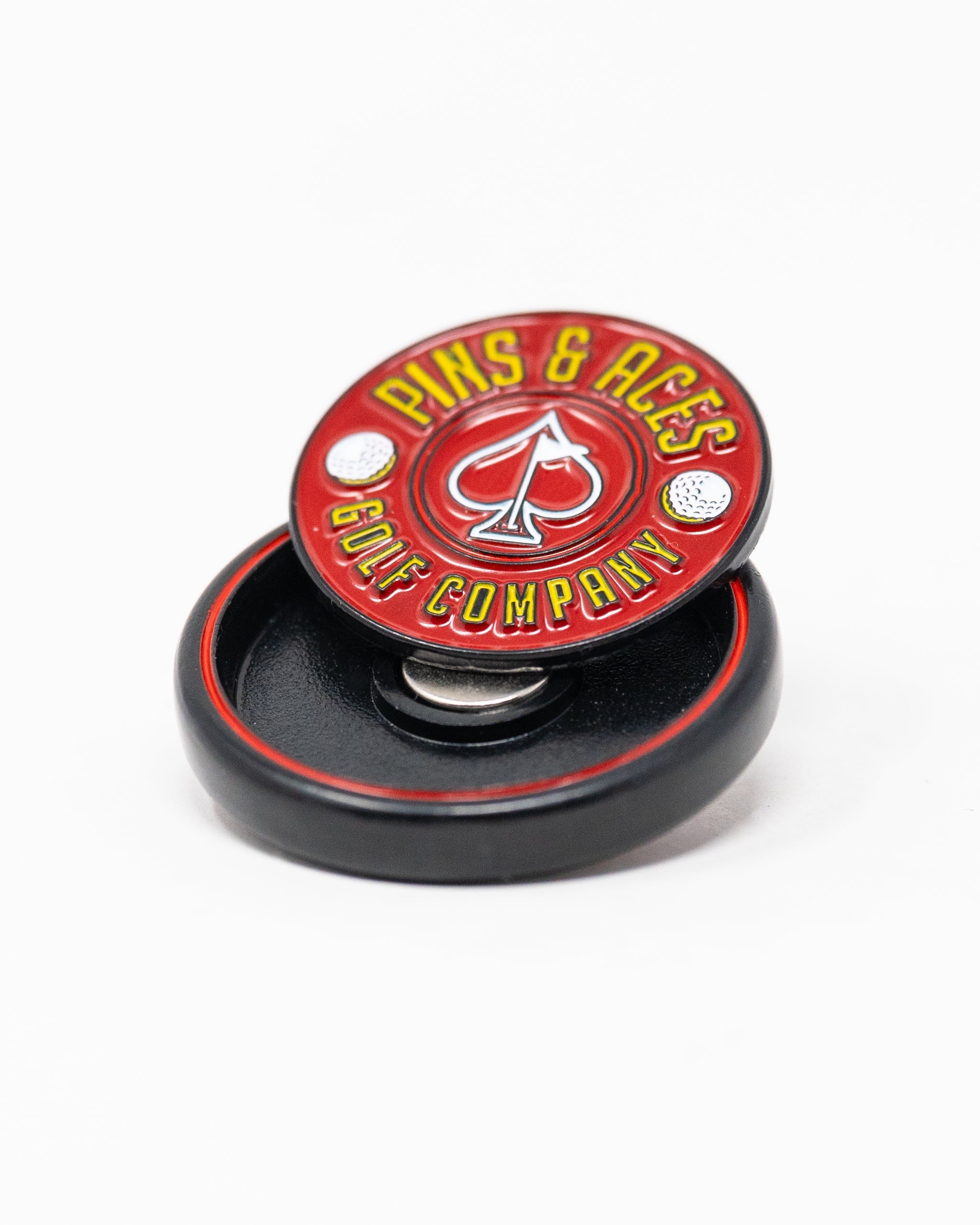 Red Pop Out Medallion Ball Marker with circular design.