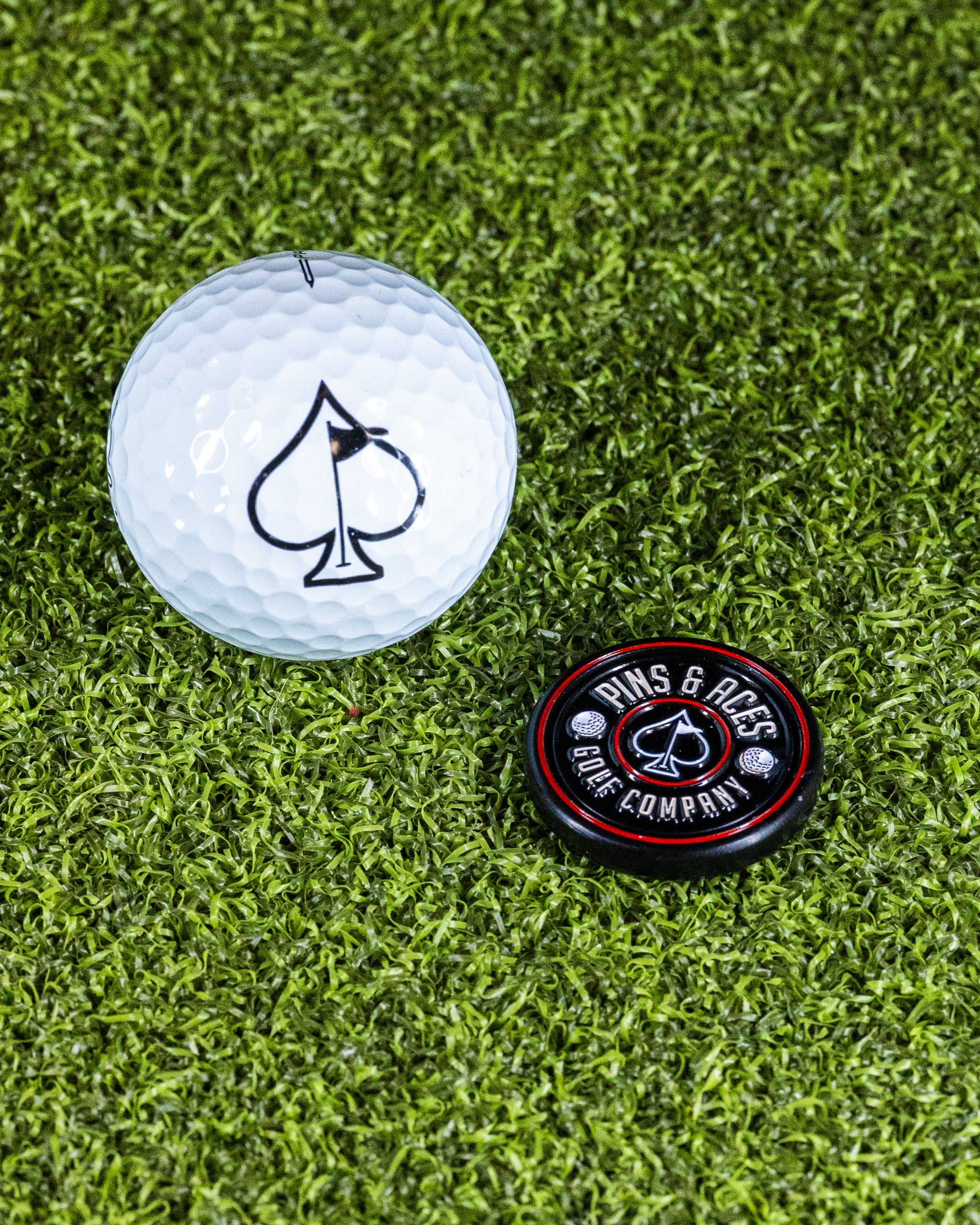 Black Pop Out Medallion Ball Marker featuring a sleek design, ideal for golf enthusiasts.