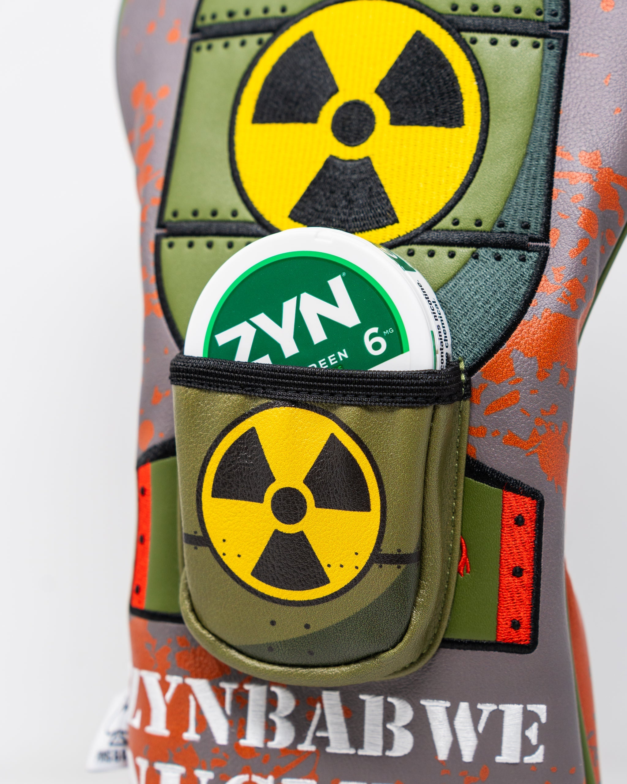 Zynbabwe Nuclear Program golf driver cover featuring a sleek design with a bold emblem.