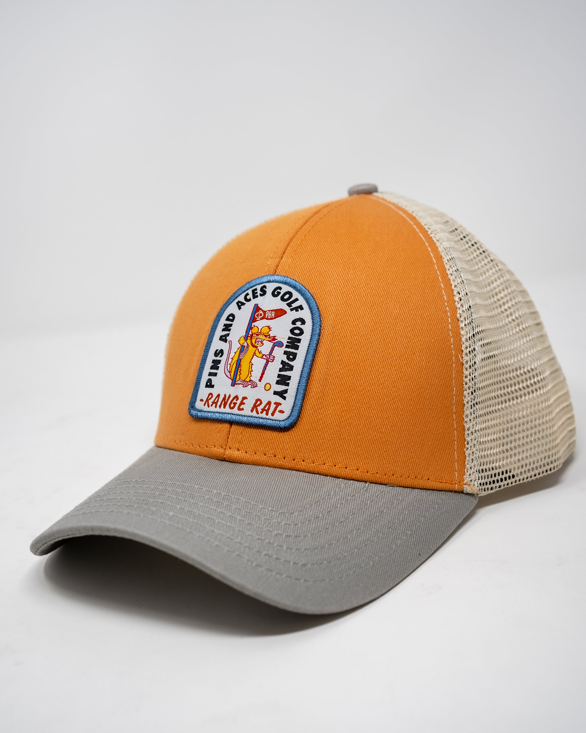 Orange trucker hat featuring a "Range Rat" logo on the front panel.