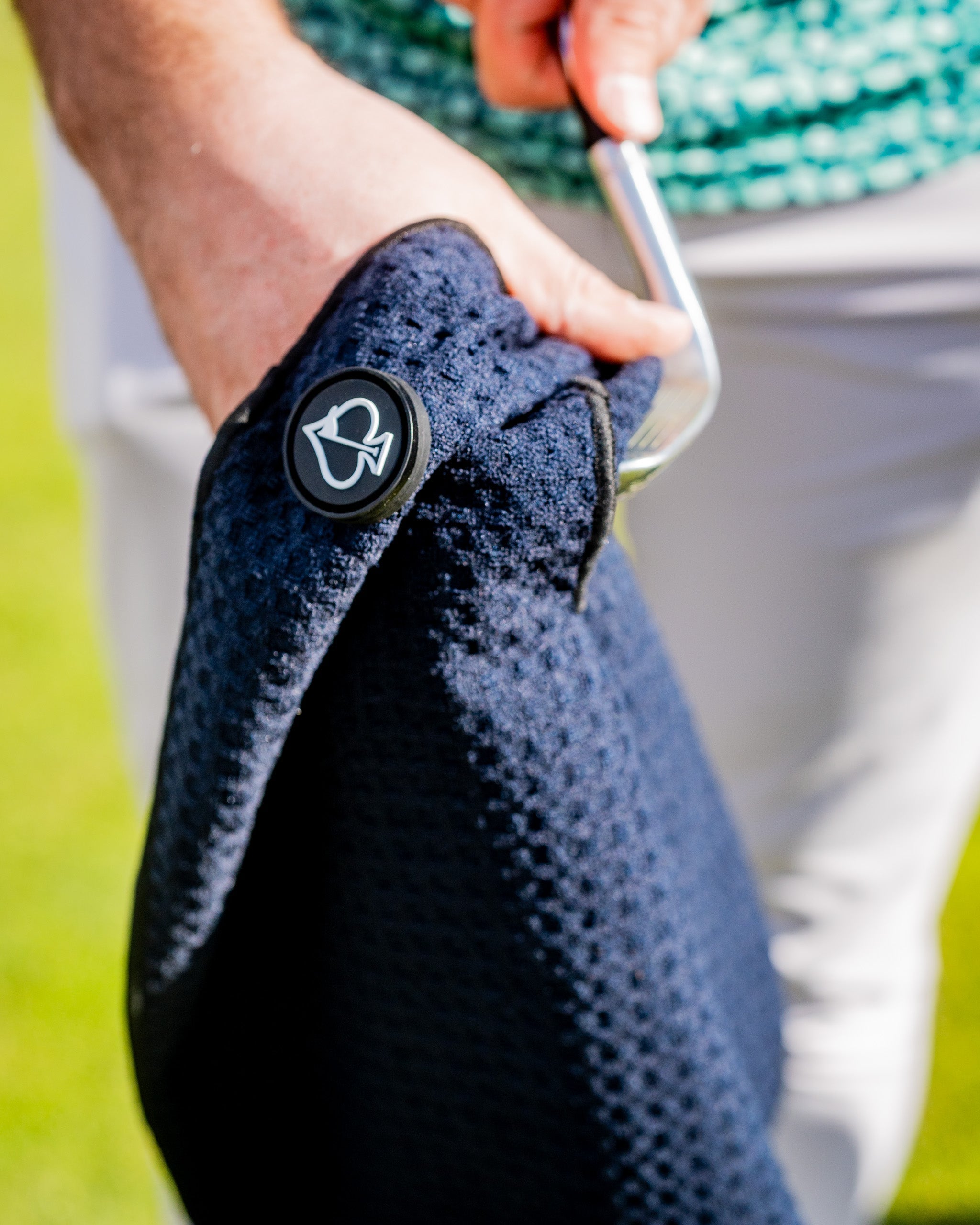 Black magnetic towel featuring a sleek design, ideal for convenience and easy storage.