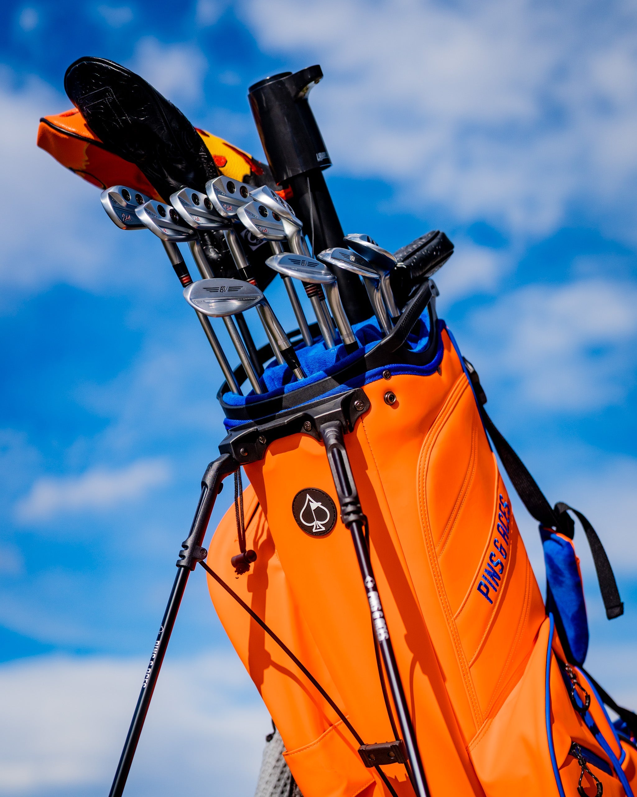 Orange Crush Player Preferred™ Golf Bag with multiple pockets and a sleek design, ideal for golf enthusiasts.