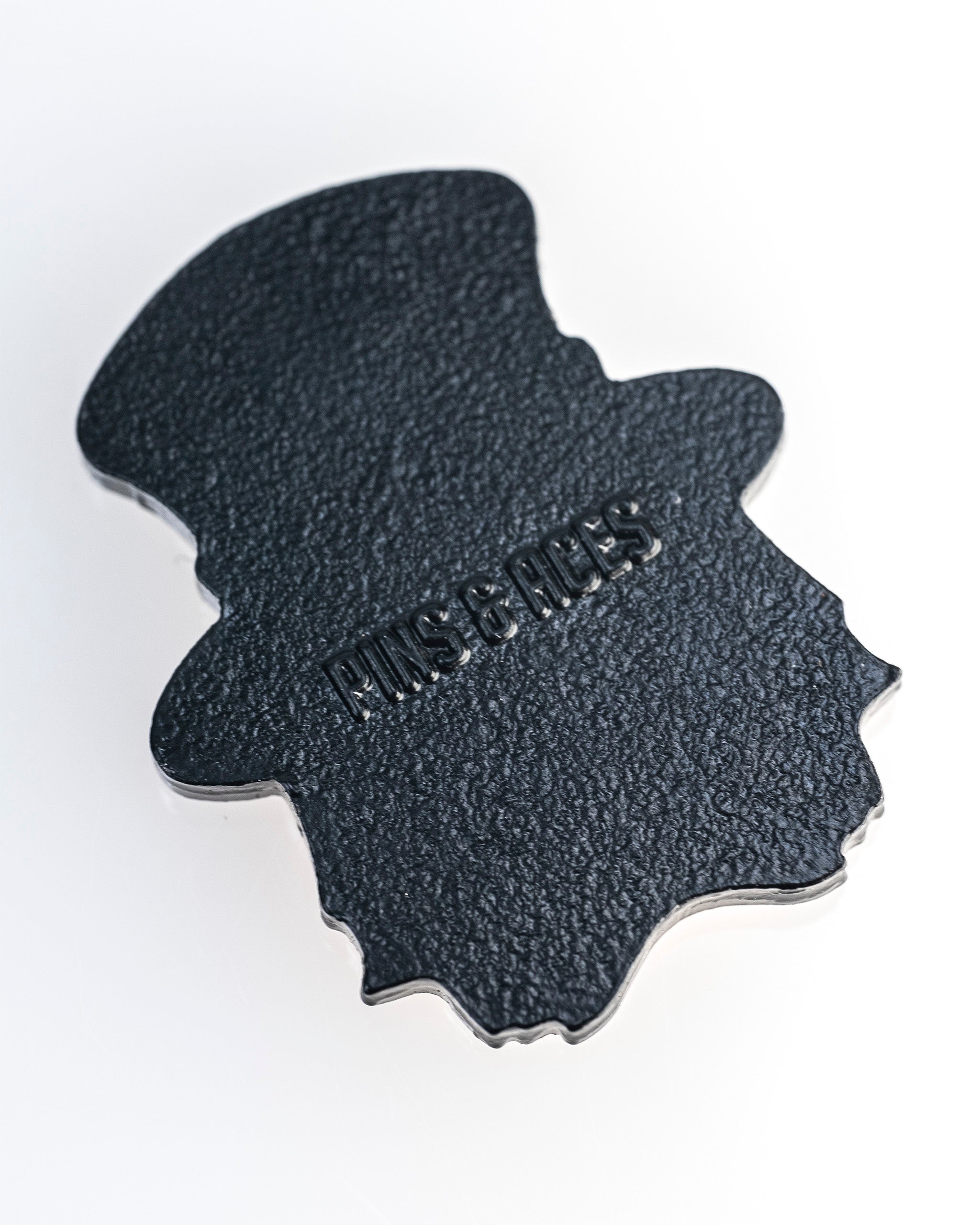 Seamus the Degenerate Ball Marker featuring a playful design with vibrant colors and a humorous character illustration, perfect for golf enthusiasts.