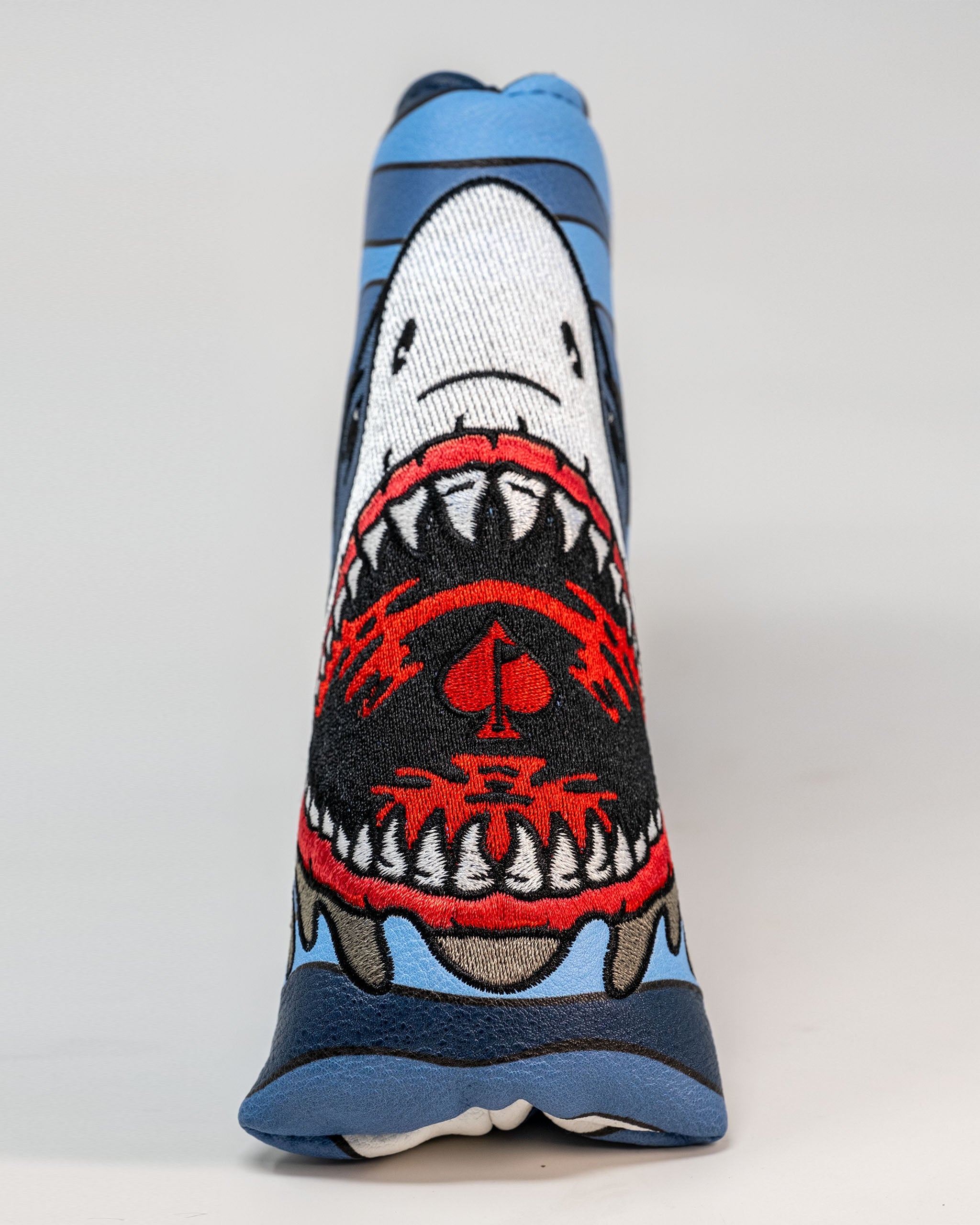 Shark Attack Blade Putter Cover featuring vibrant shark graphic design and durable material.