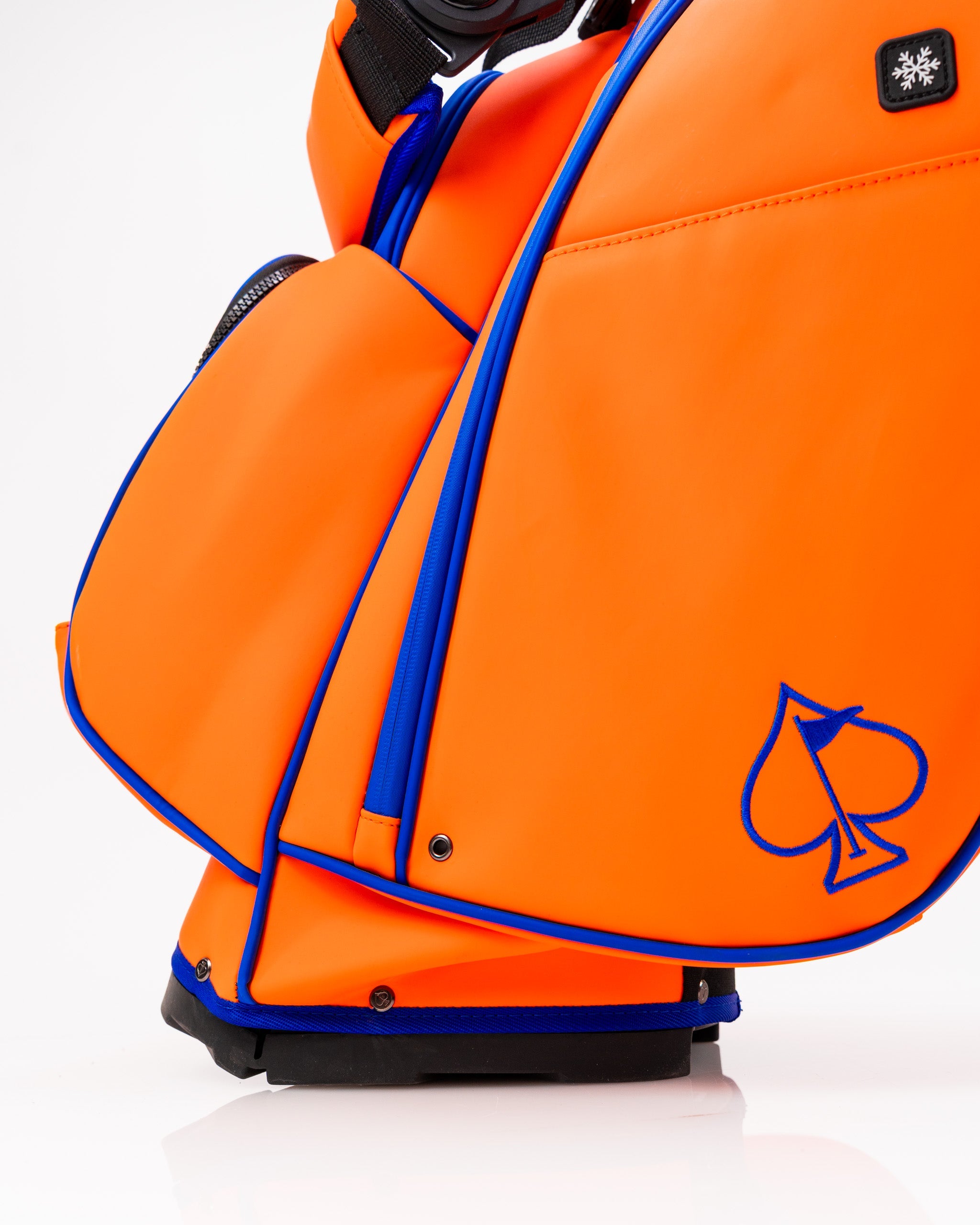 Player Preferred™ Golf Bag in vibrant orange, featuring multiple pockets for storage, a comfortable shoulder strap, and a sleek design suitable for avid golfers.