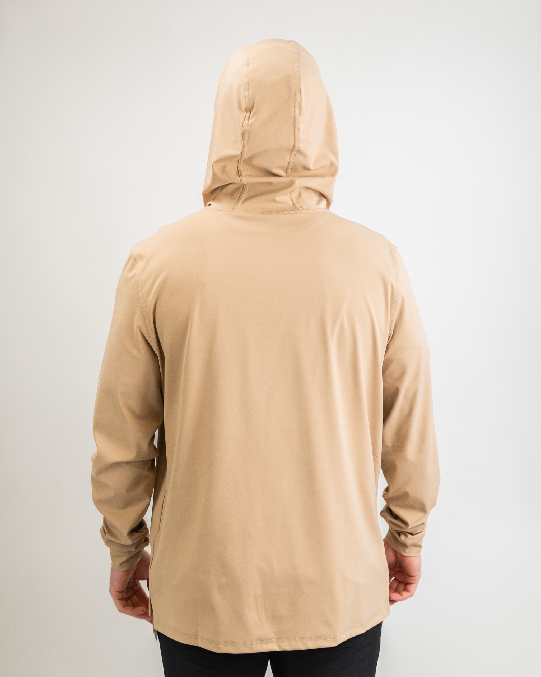Performance Golf Hoodie in Big Blind Sand color, featuring a hood and long sleeves, designed for active wear.