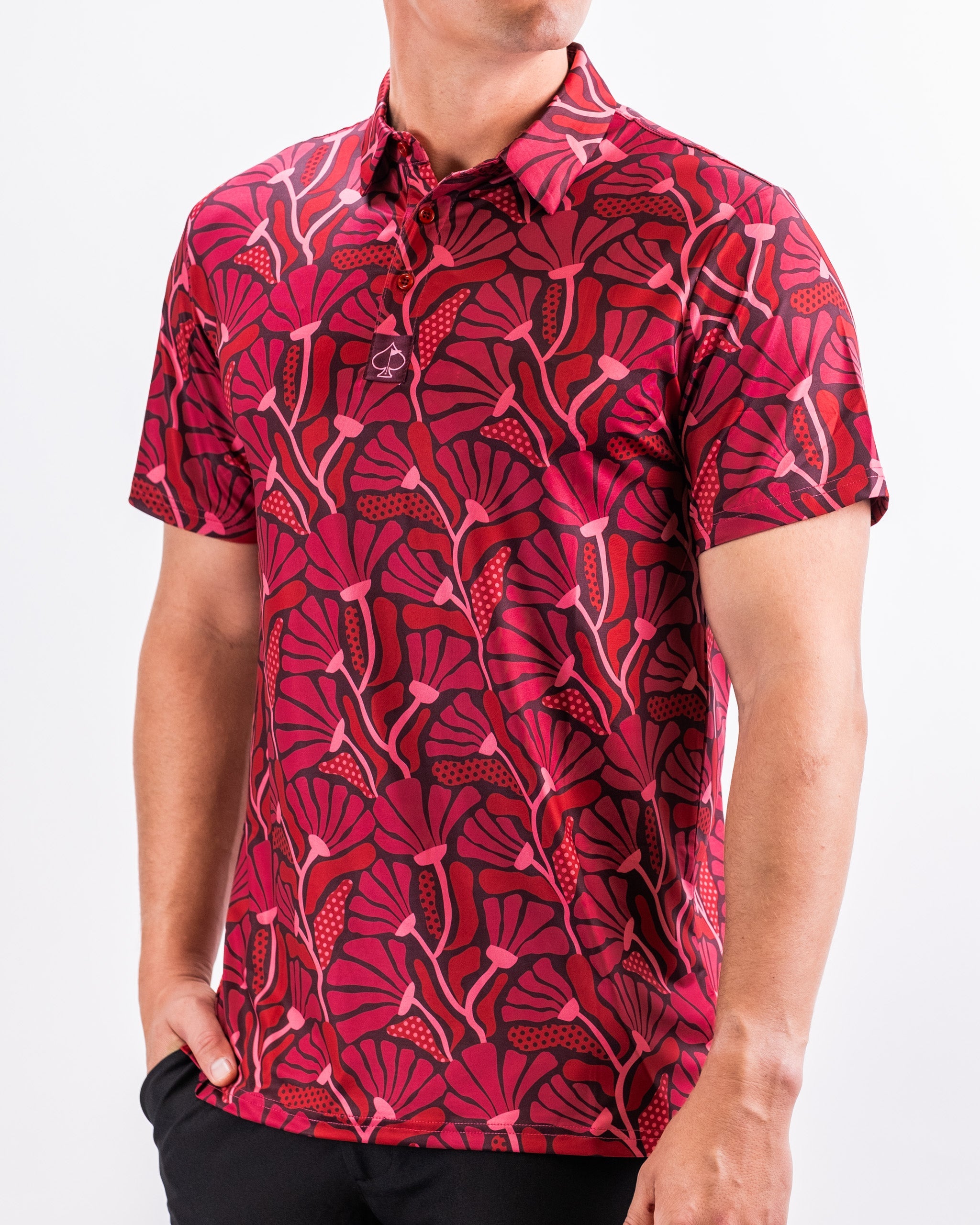 Crimson floral print shirt from the Garden Party collection, featuring short sleeves and a relaxed fit, set against a light background.