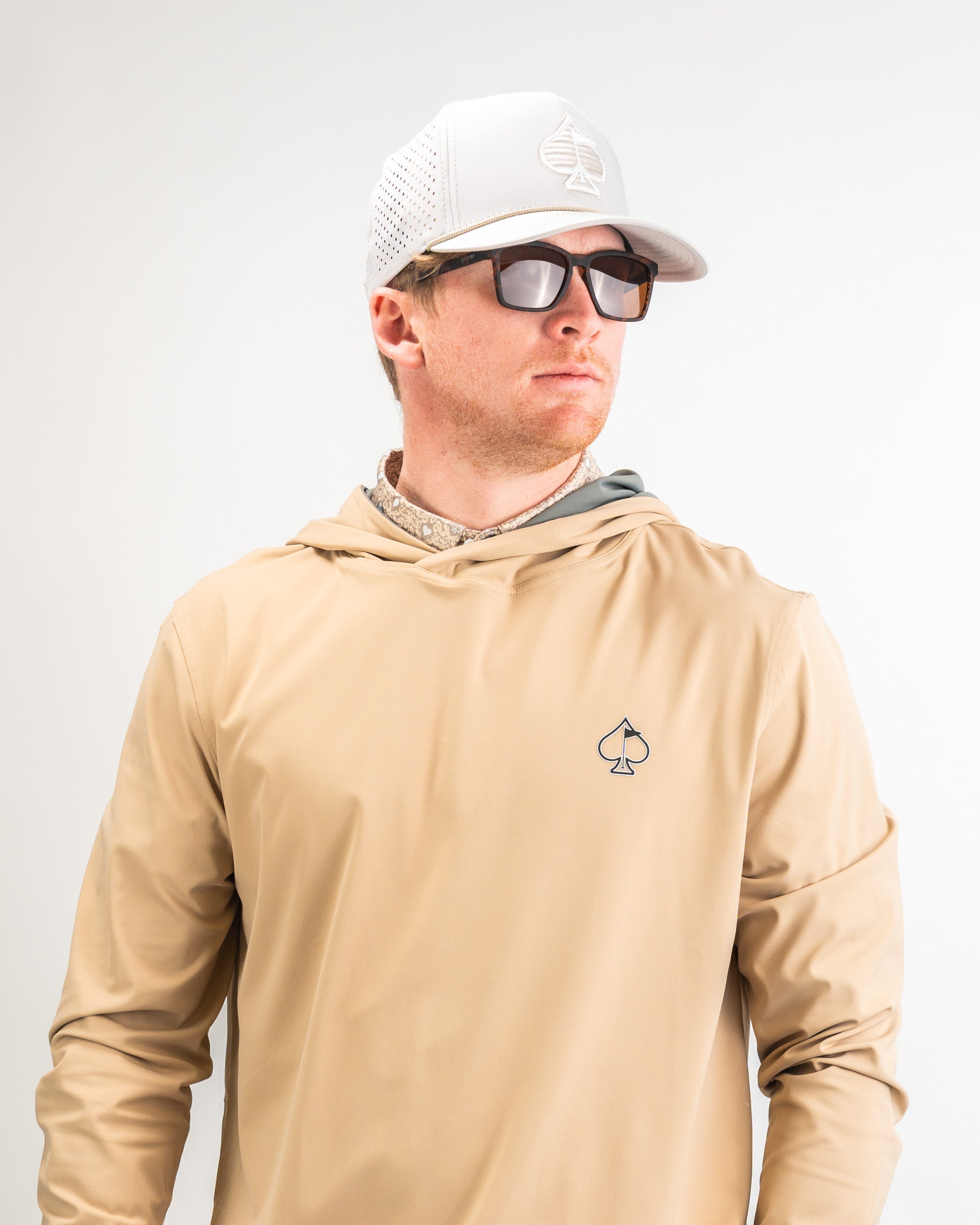 Performance Golf Hoodie in Big Blind Sand color, featuring a modern design and comfortable fit, ideal for golf enthusiasts.