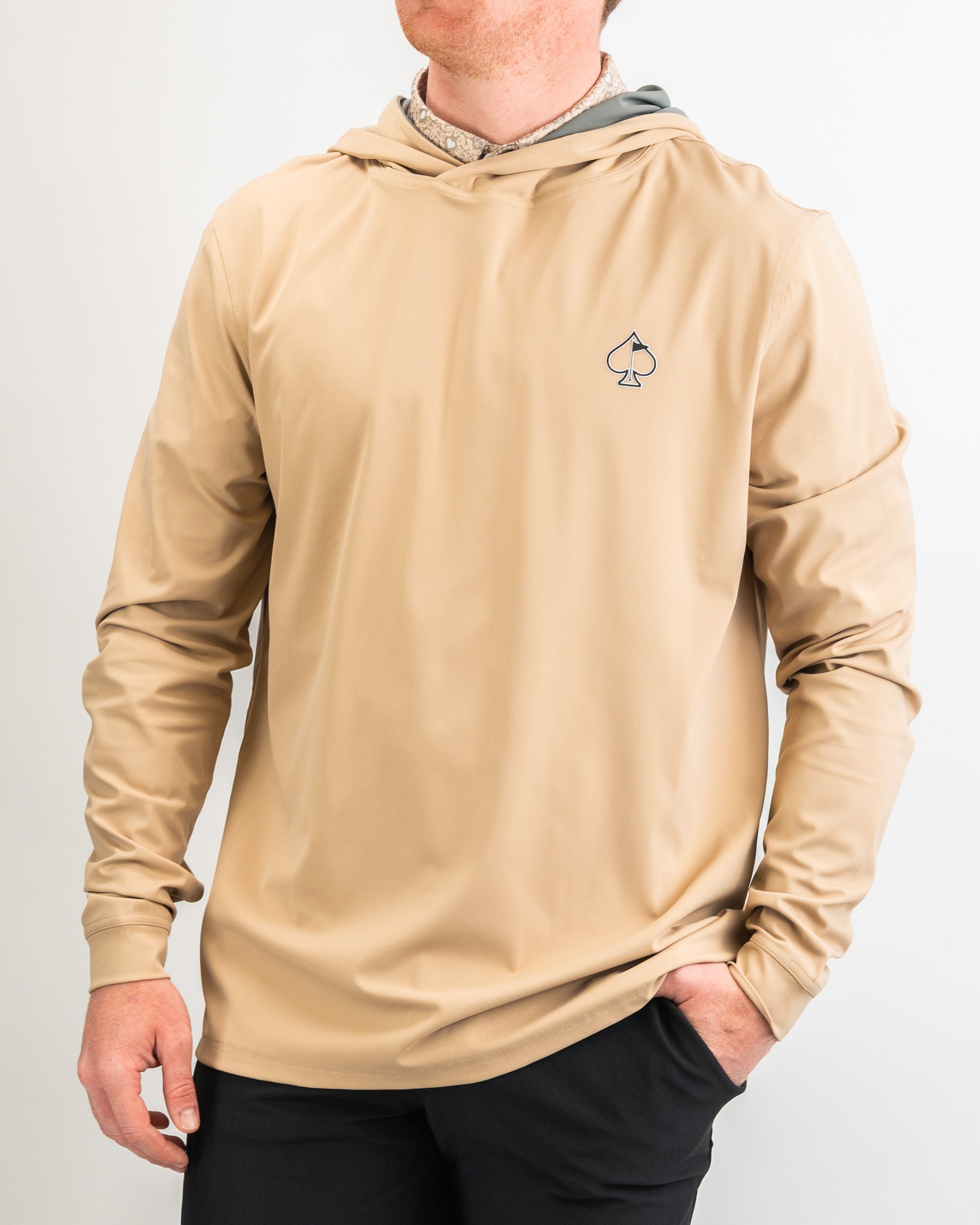 Performance golf hoodie in Big Blind Sand color, featuring a stylish design and comfortable fit, ideal for outdoor sports.
