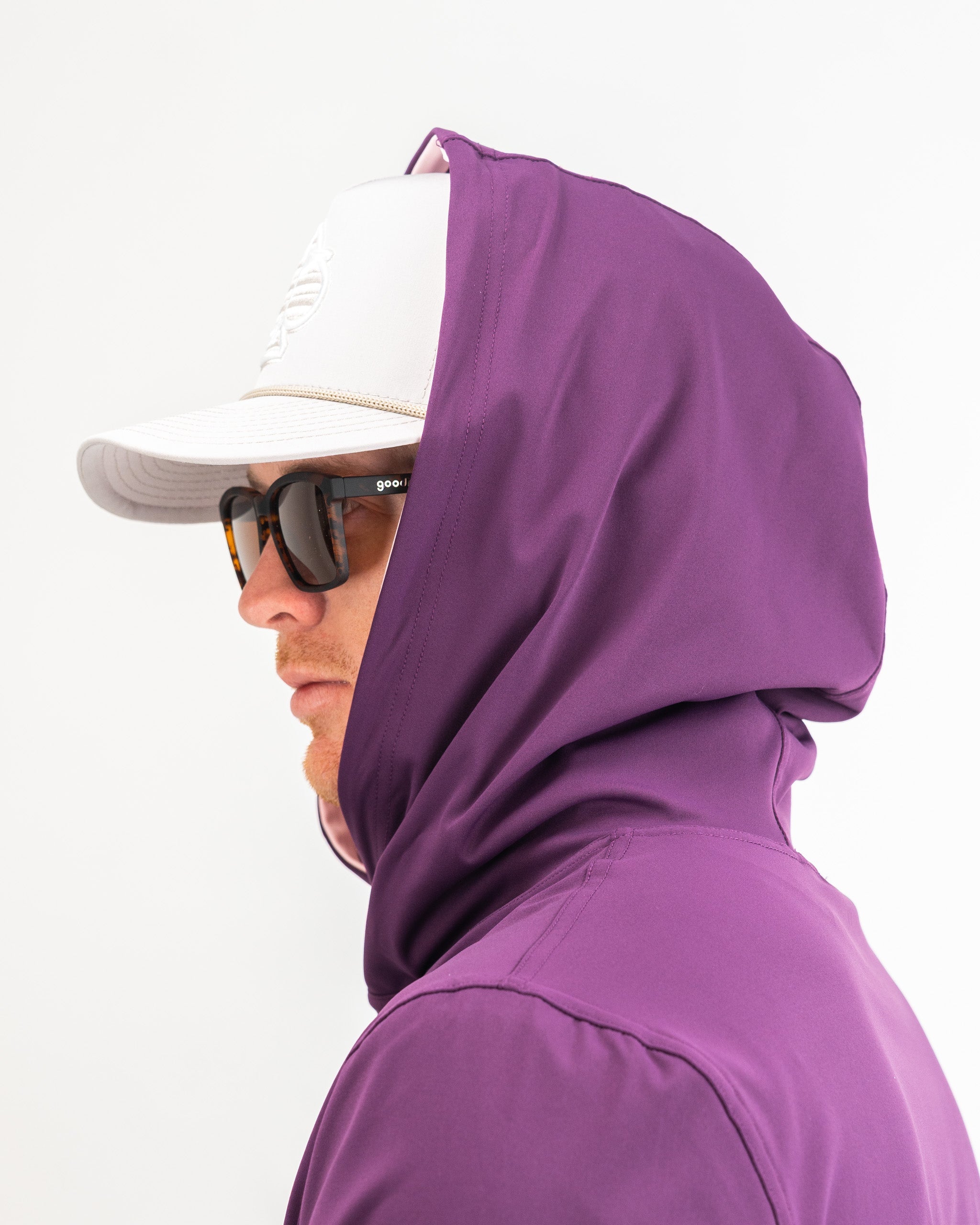 Performance Golf Hoodie in Houndstooth Raspberry pattern, showcasing a stylish and functional design suitable for active wear.